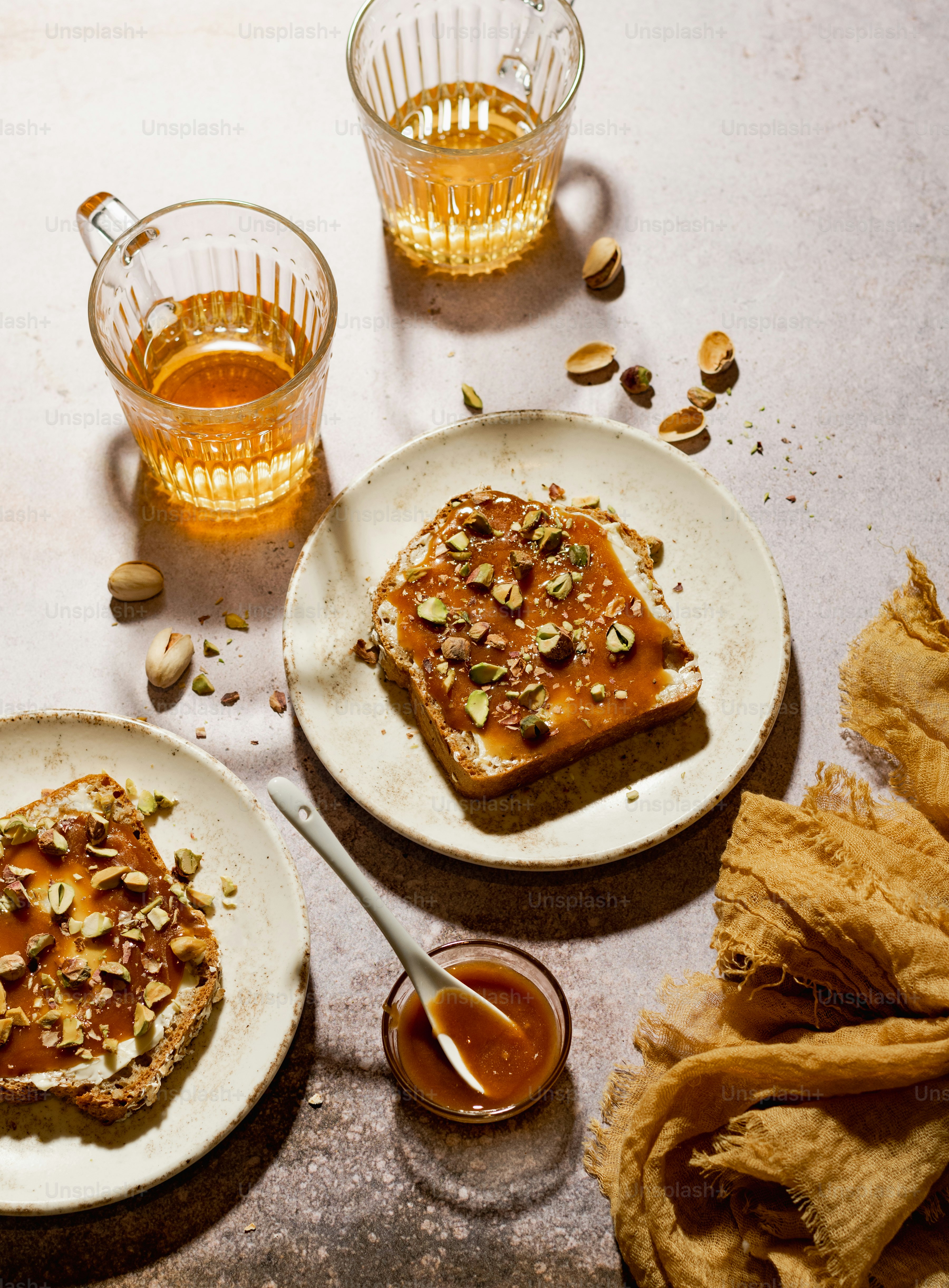 a table topped with two plates of food