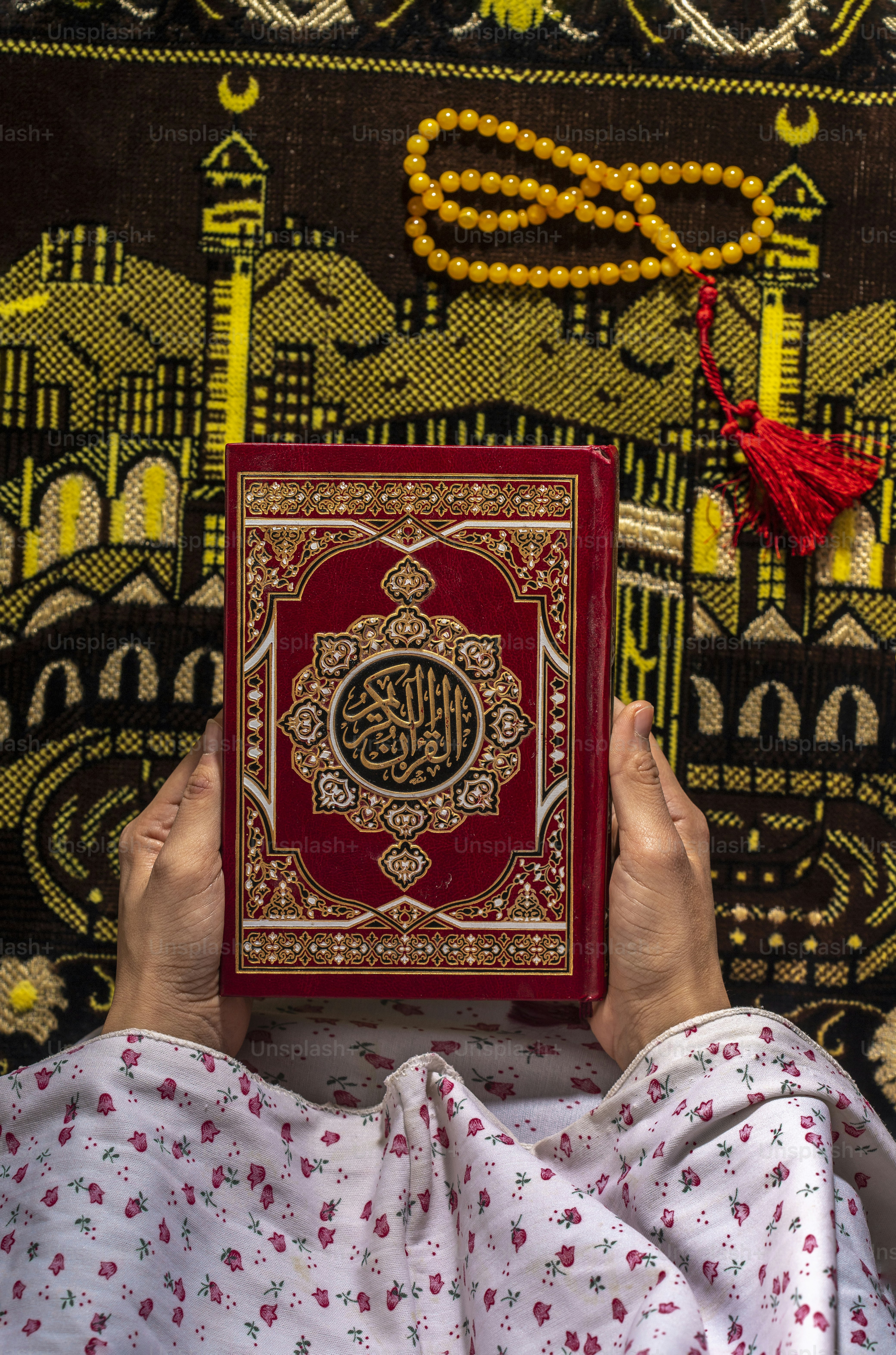 a person is holding a book in their hands