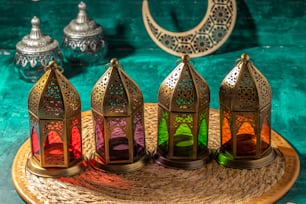 a group of colorful lanterns sitting on top of a table