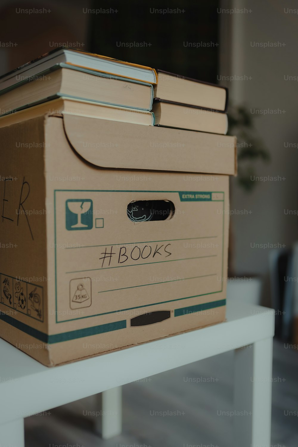 a stack of books sitting on top of a table