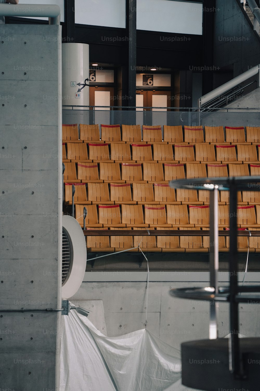 an empty auditorium with a lot of chairs