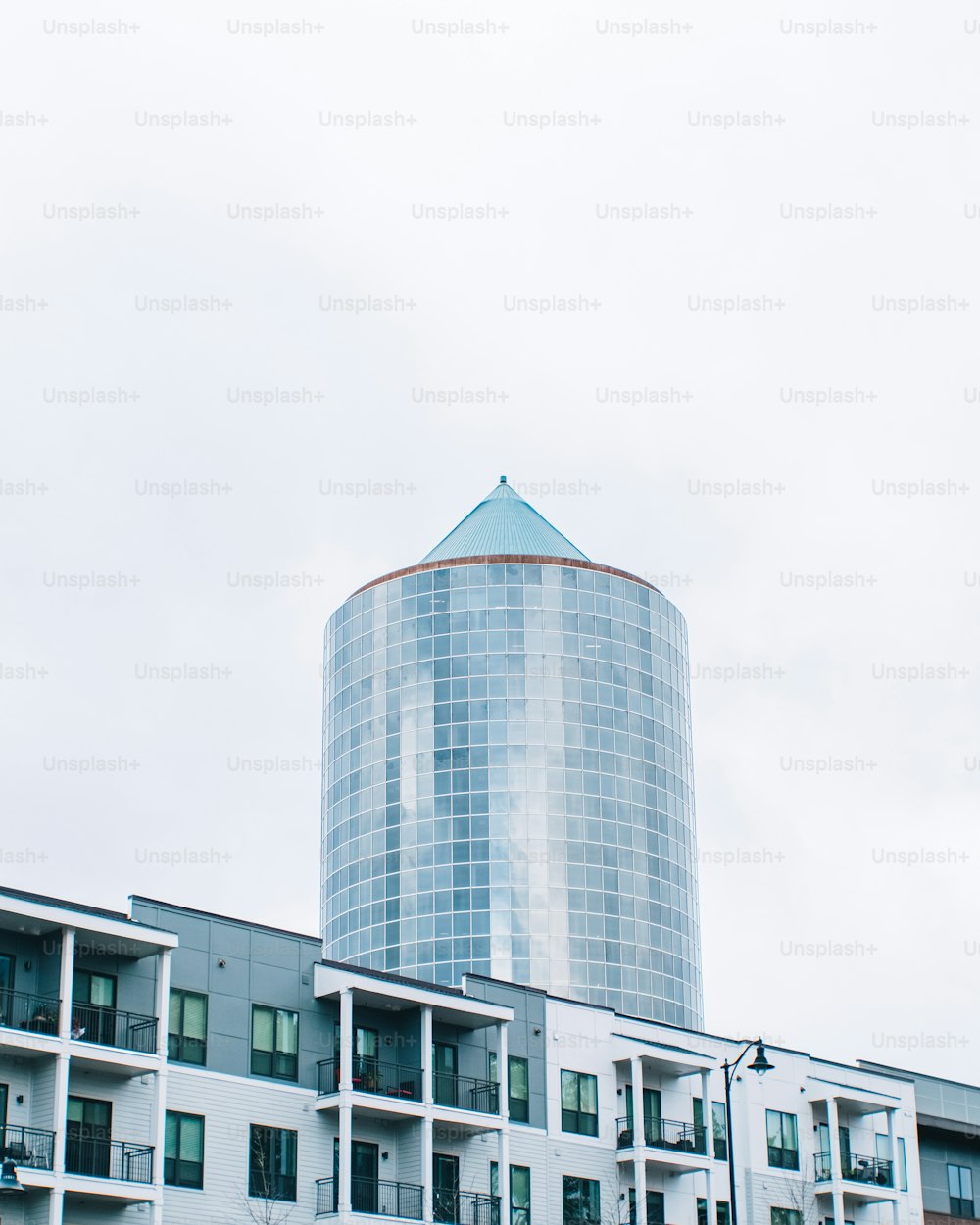 a tall building with a blue dome on top of it