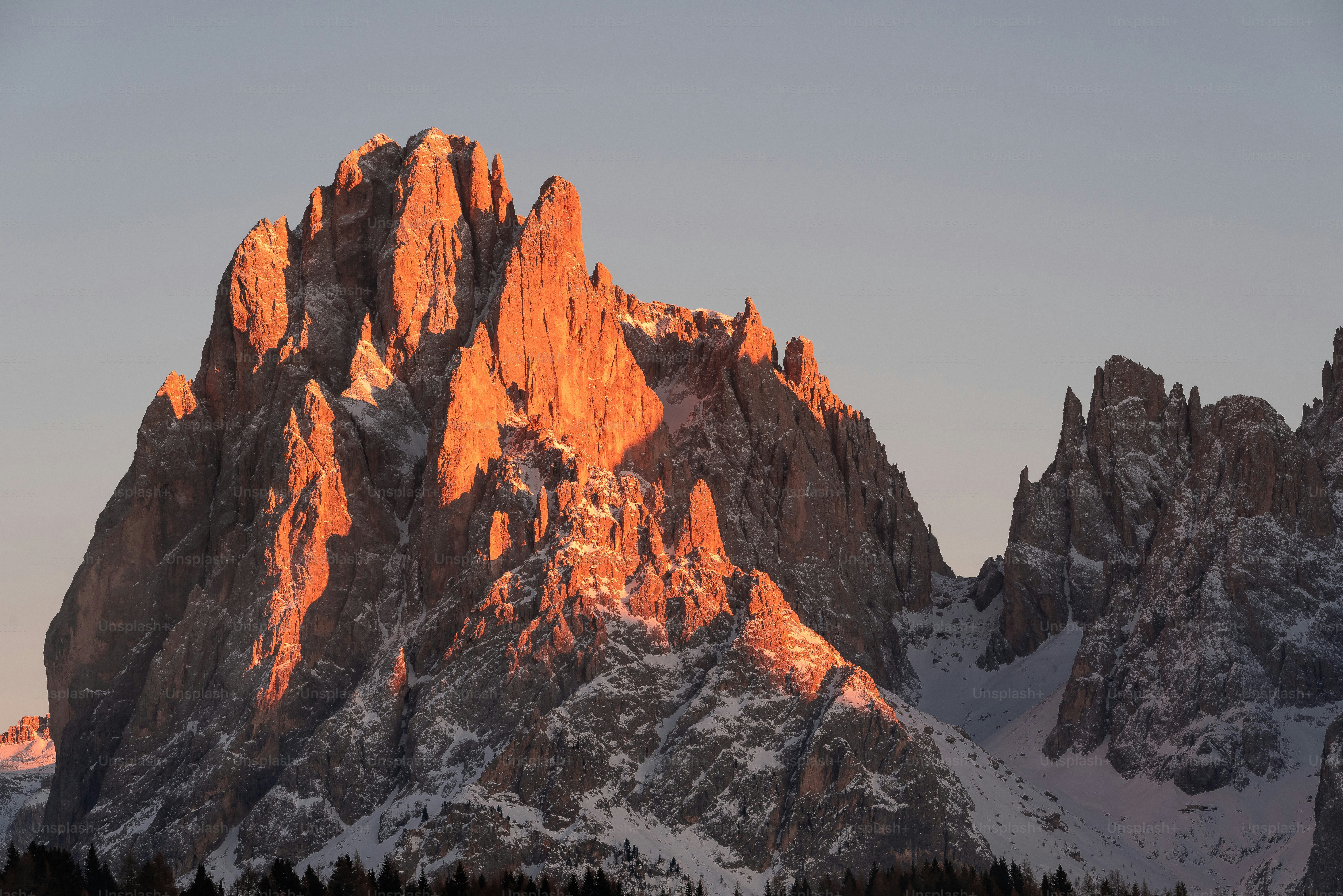 a very tall mountain with a lot of snow on it