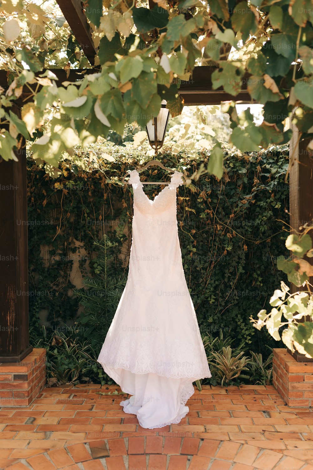 a wedding dress hanging on a clothes line