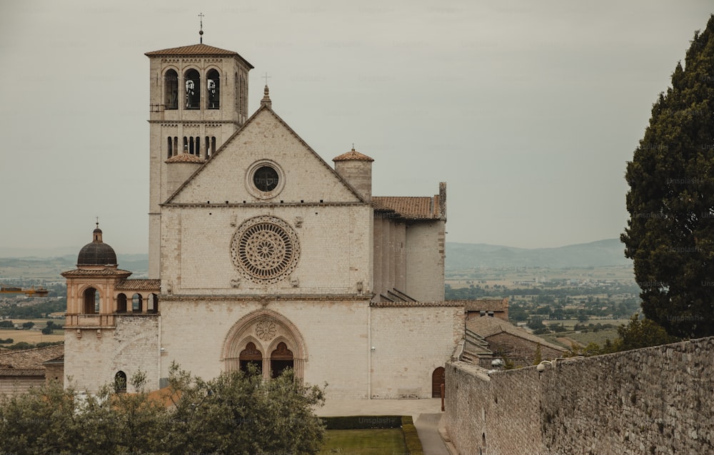 a large white church with a clock tower