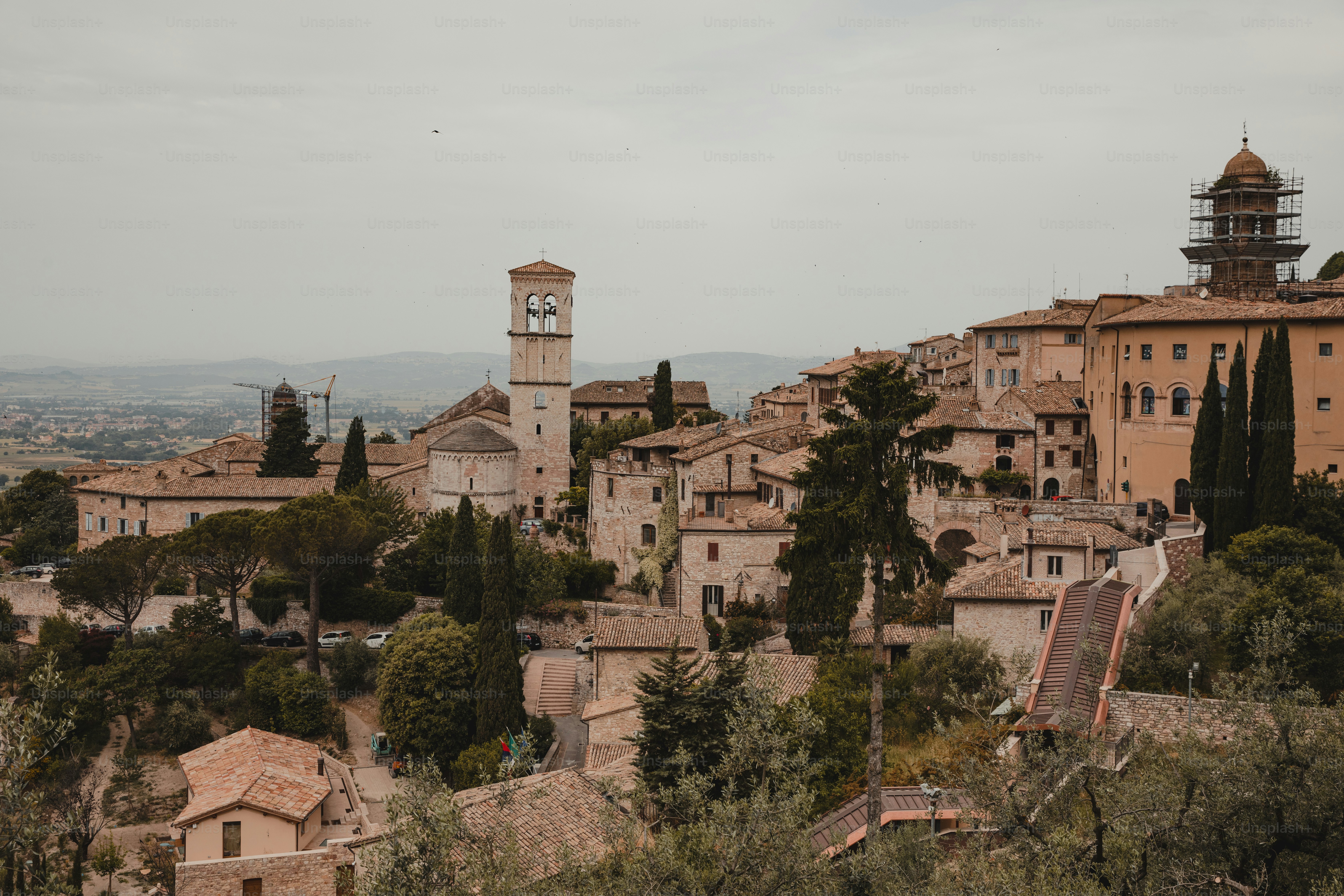 a village with a clock tower in the middle of it