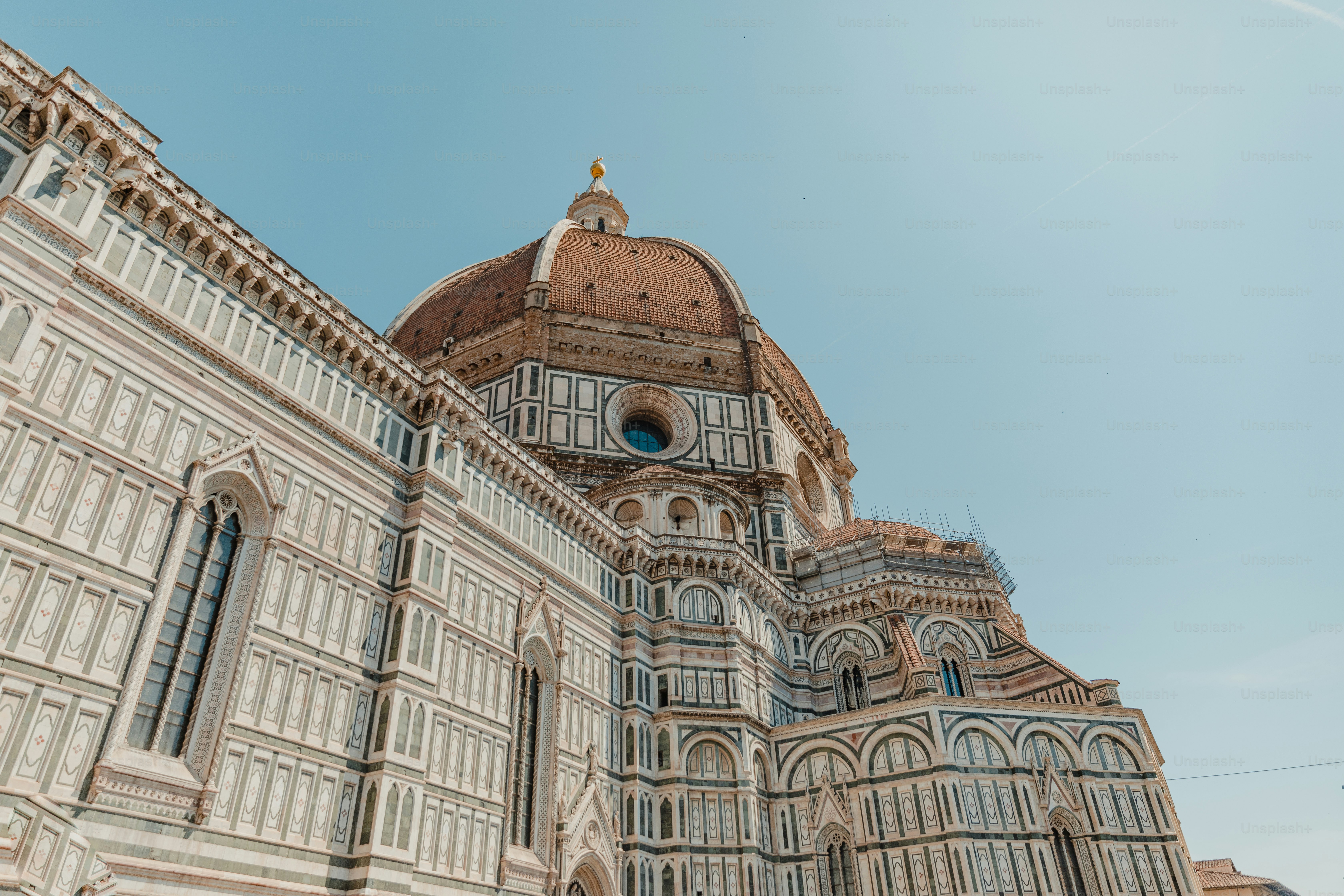 a large building with a clock on the top of it