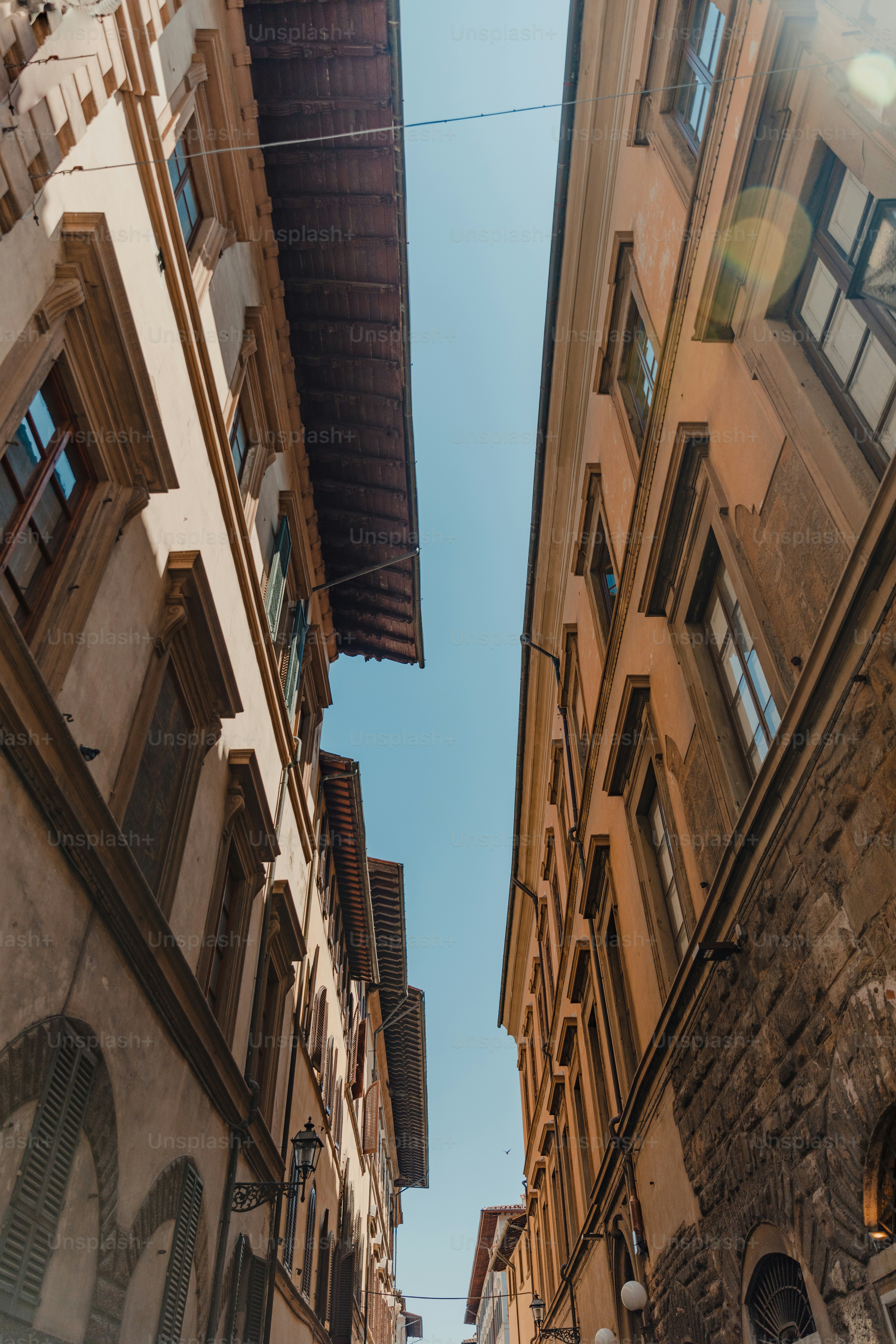 a narrow street with buildings on both sides