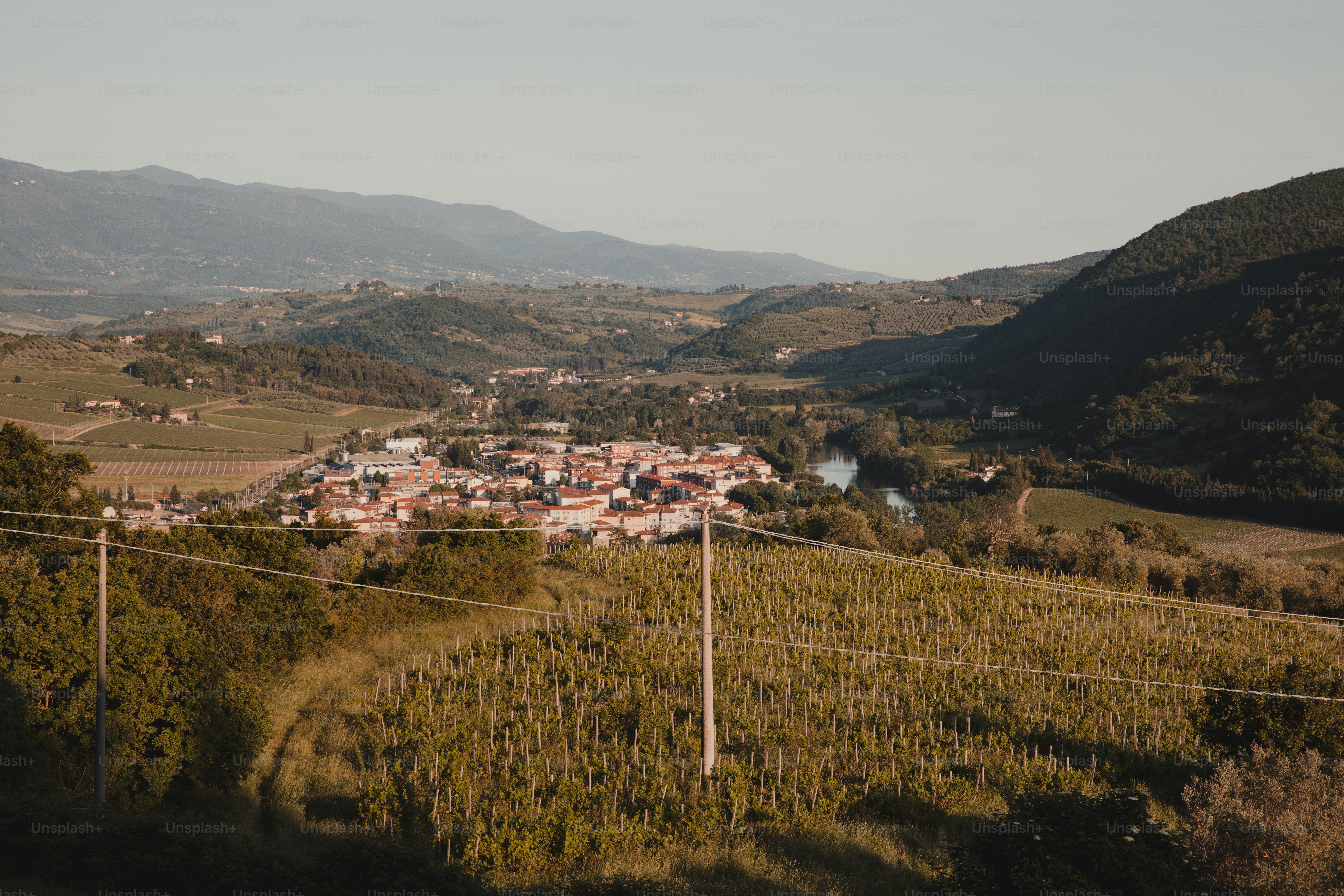 a small village nestled in a valley surrounded by mountains