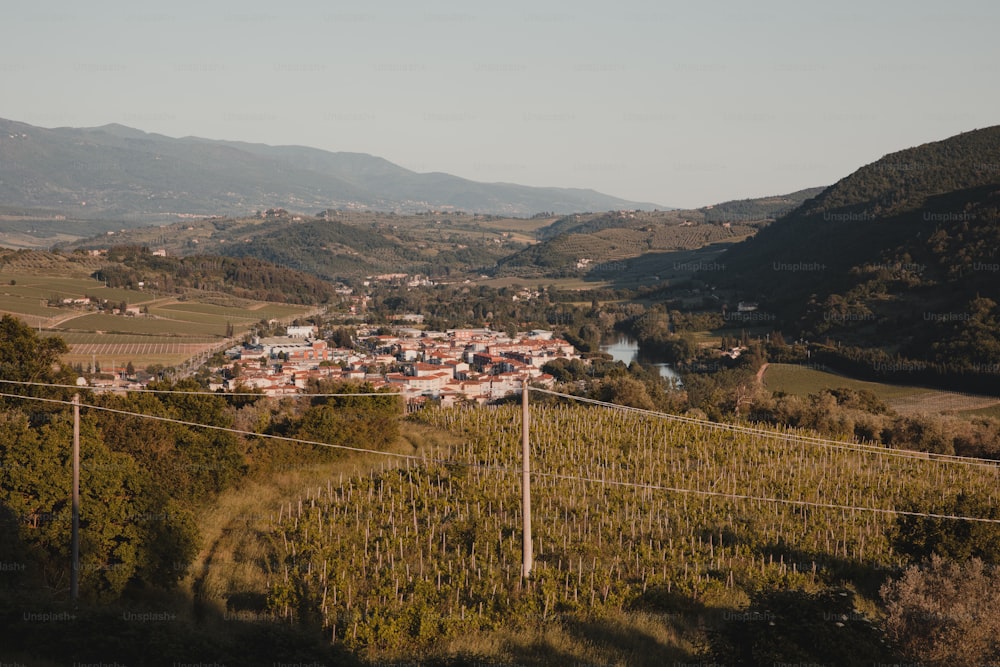 a small village nestled in a valley surrounded by mountains