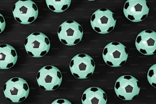Un grupo de balones de fútbol verdes y negros