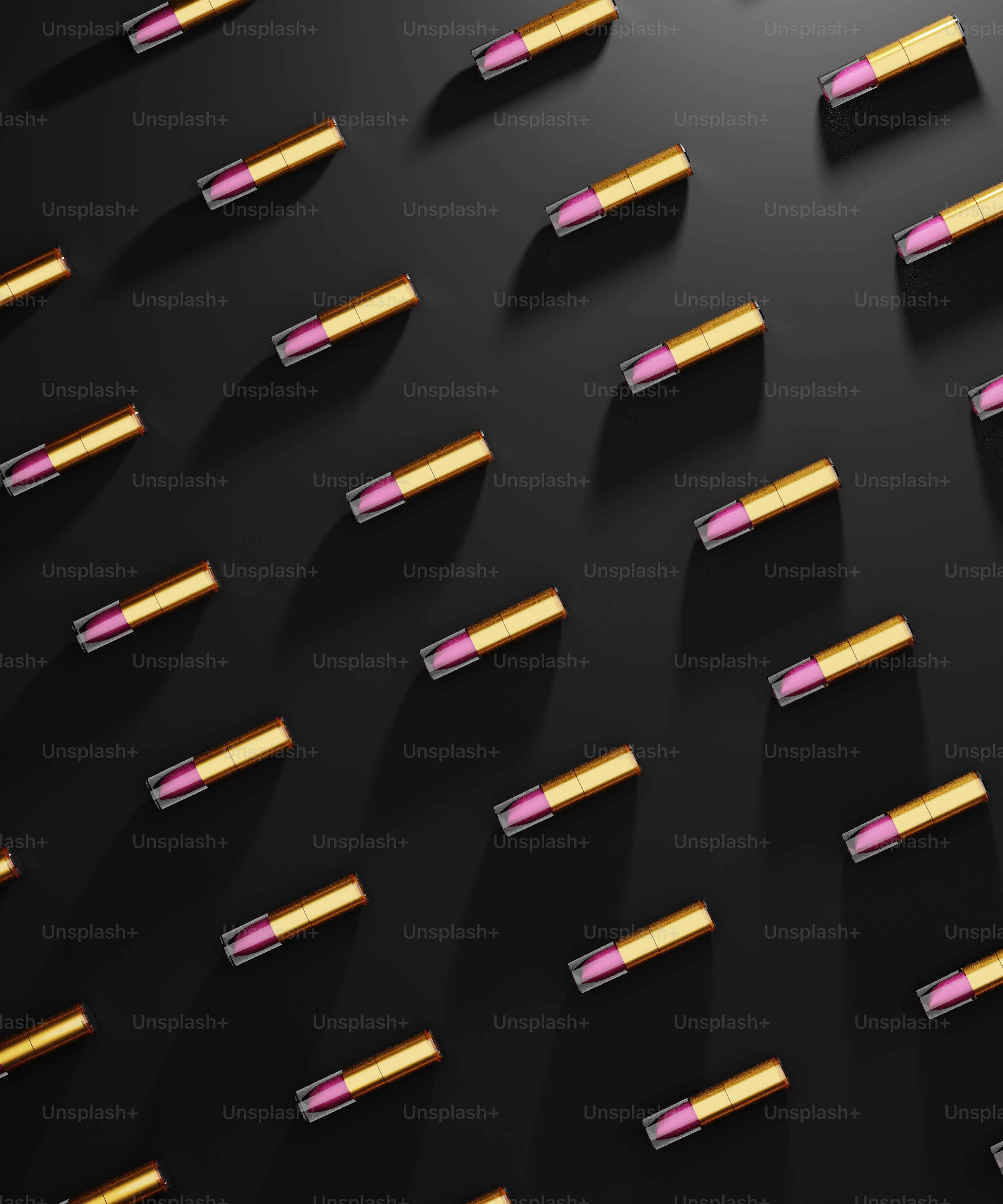 a group of lipsticks that are on a black surface