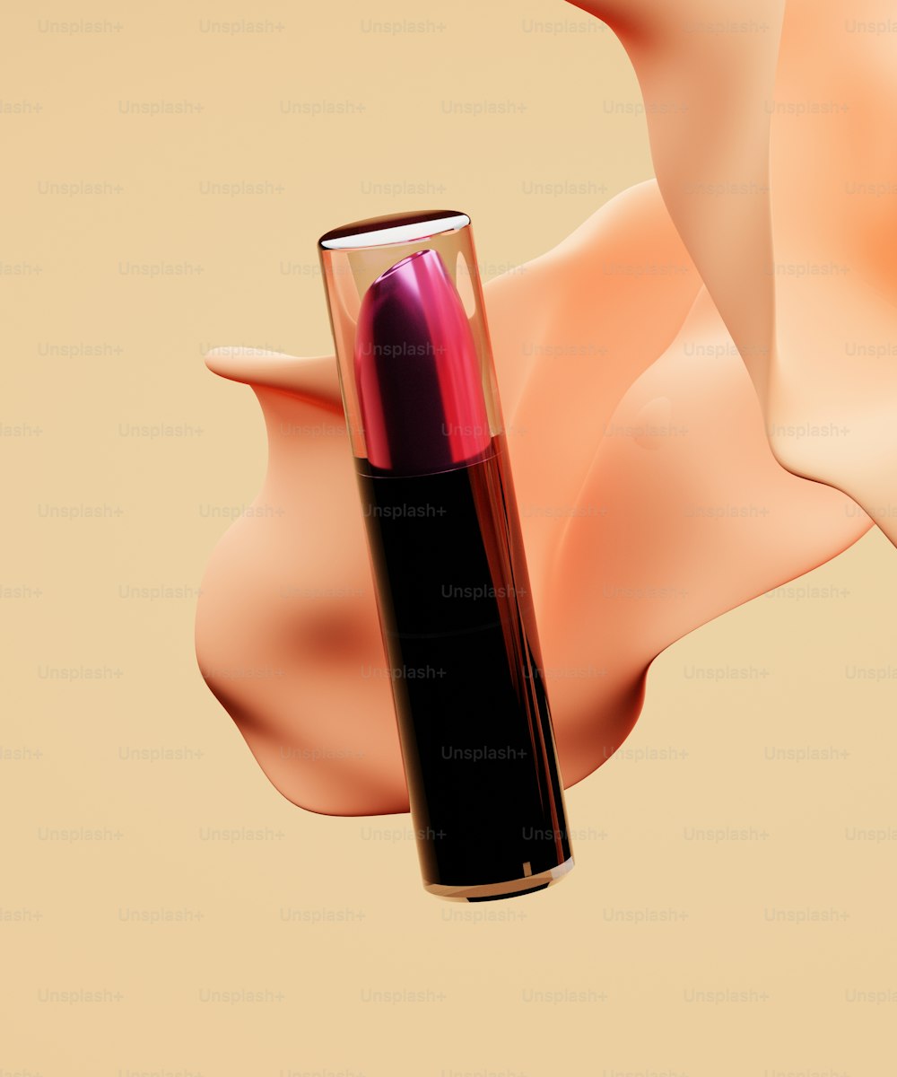 a woman's hand holding a lipstick tube