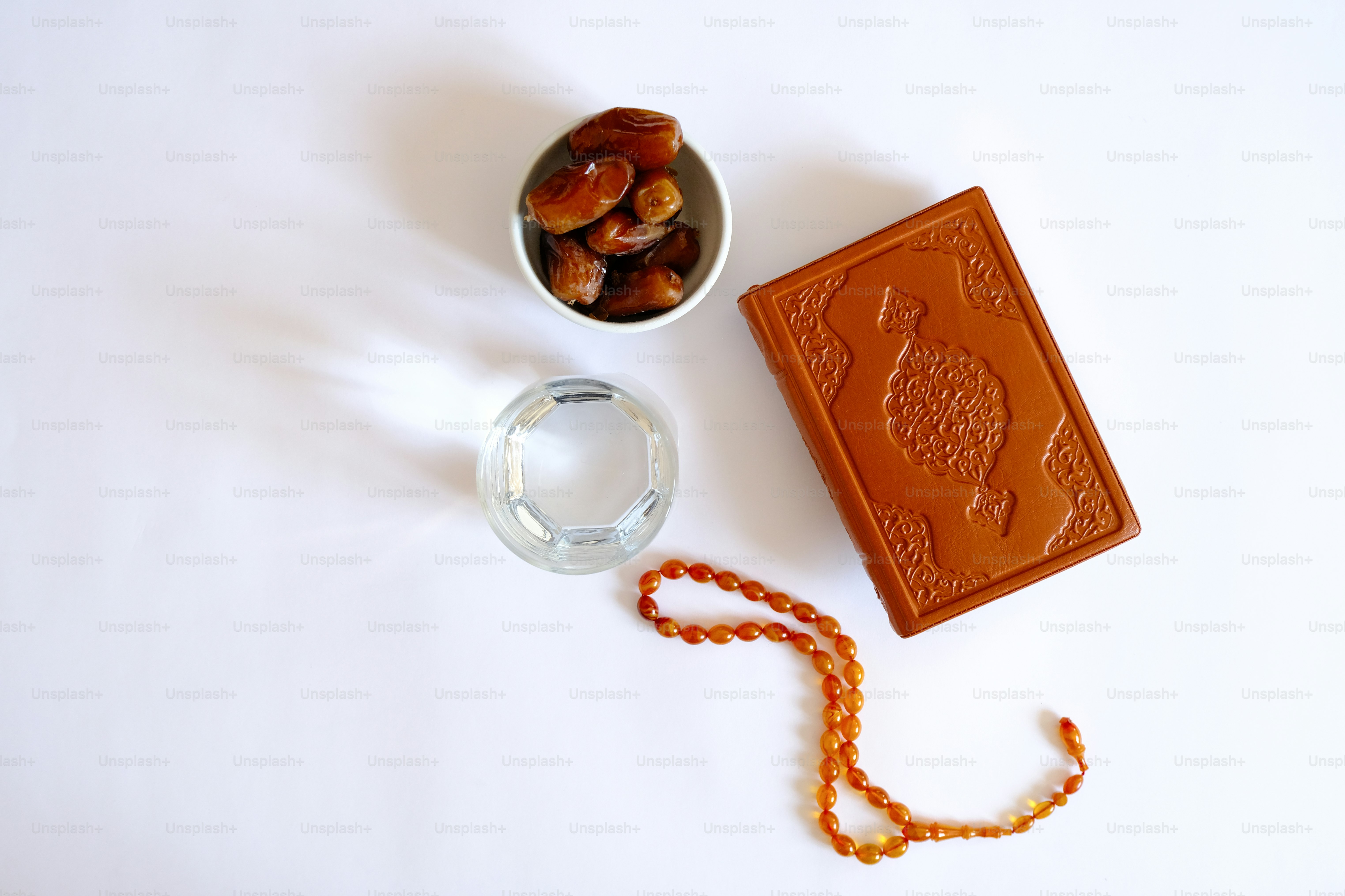 a small bowl of nuts next to a chocolate bar