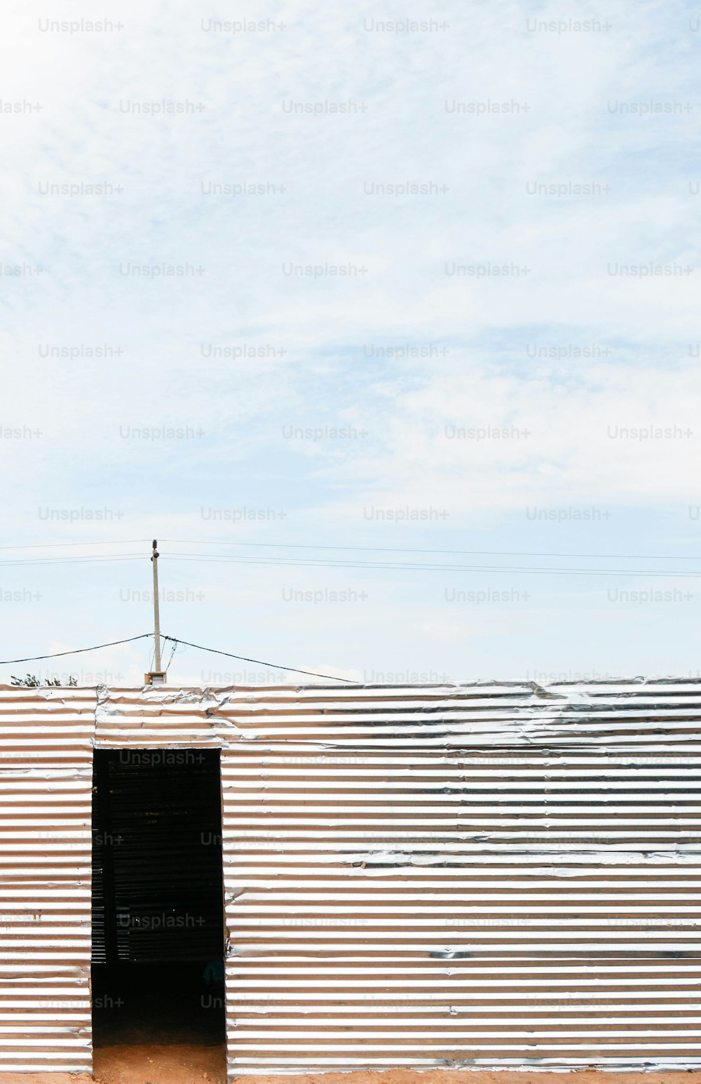 a man riding a horse in front of a building