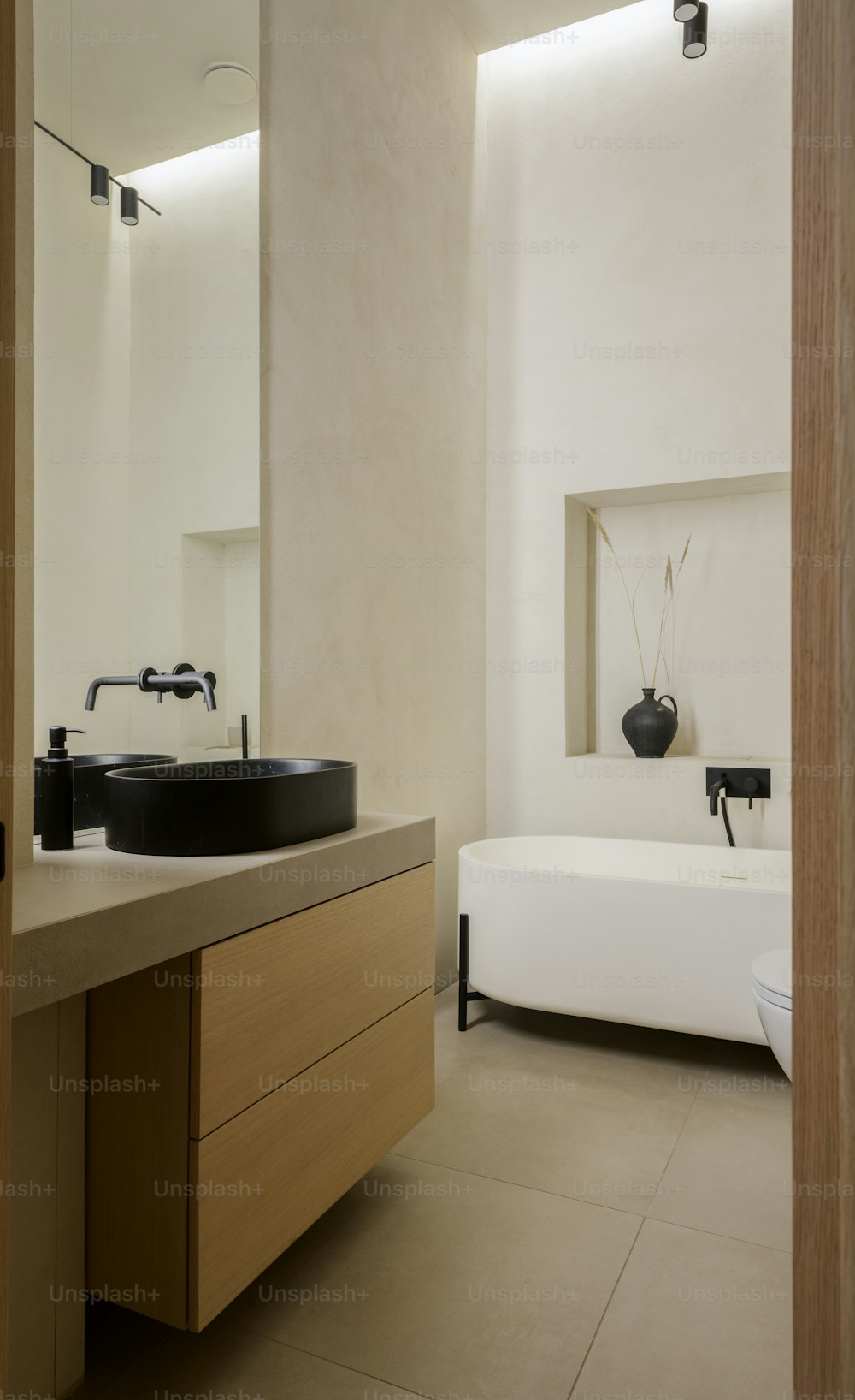 a bathroom with a sink and a bathtub