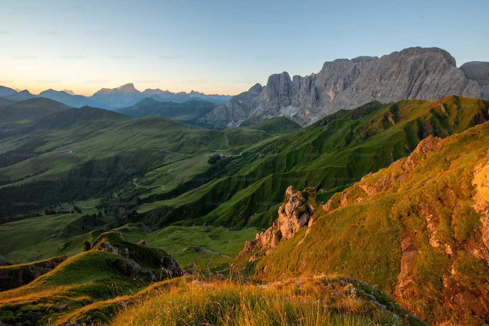 a view of a mountain range at sunset