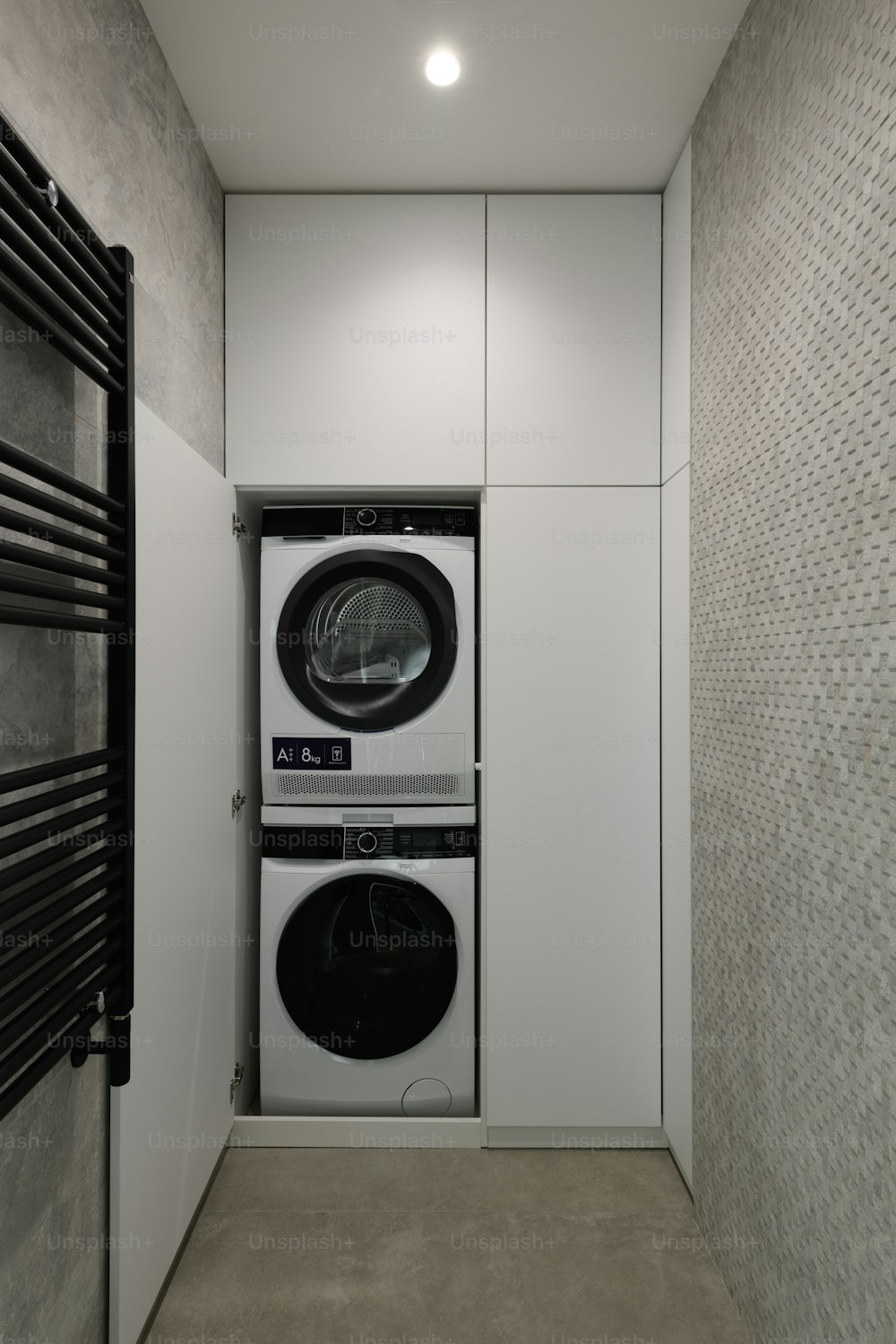 a washer and dryer in a small room