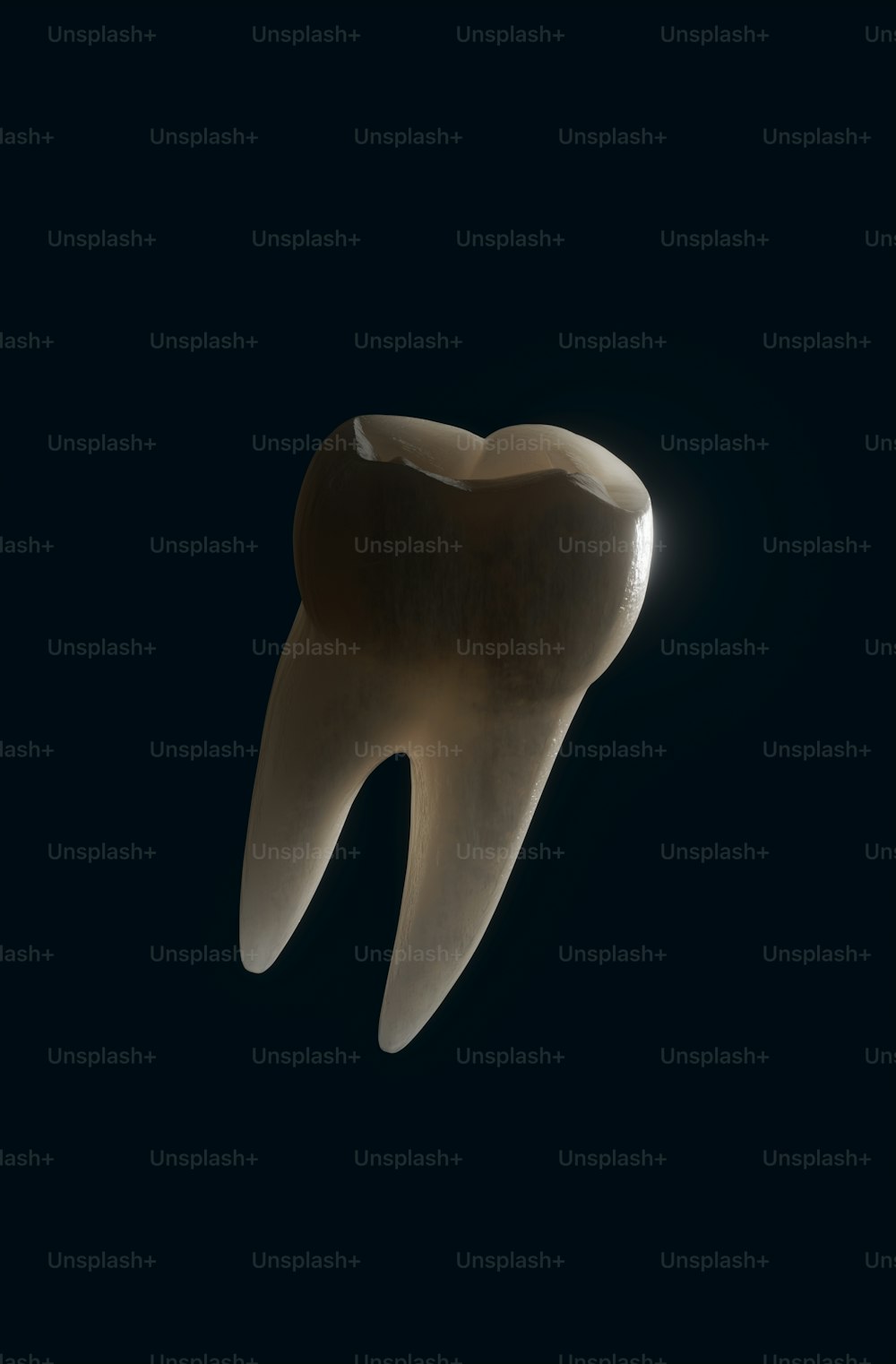 Un dente nel buio con una luce che brilla su di esso