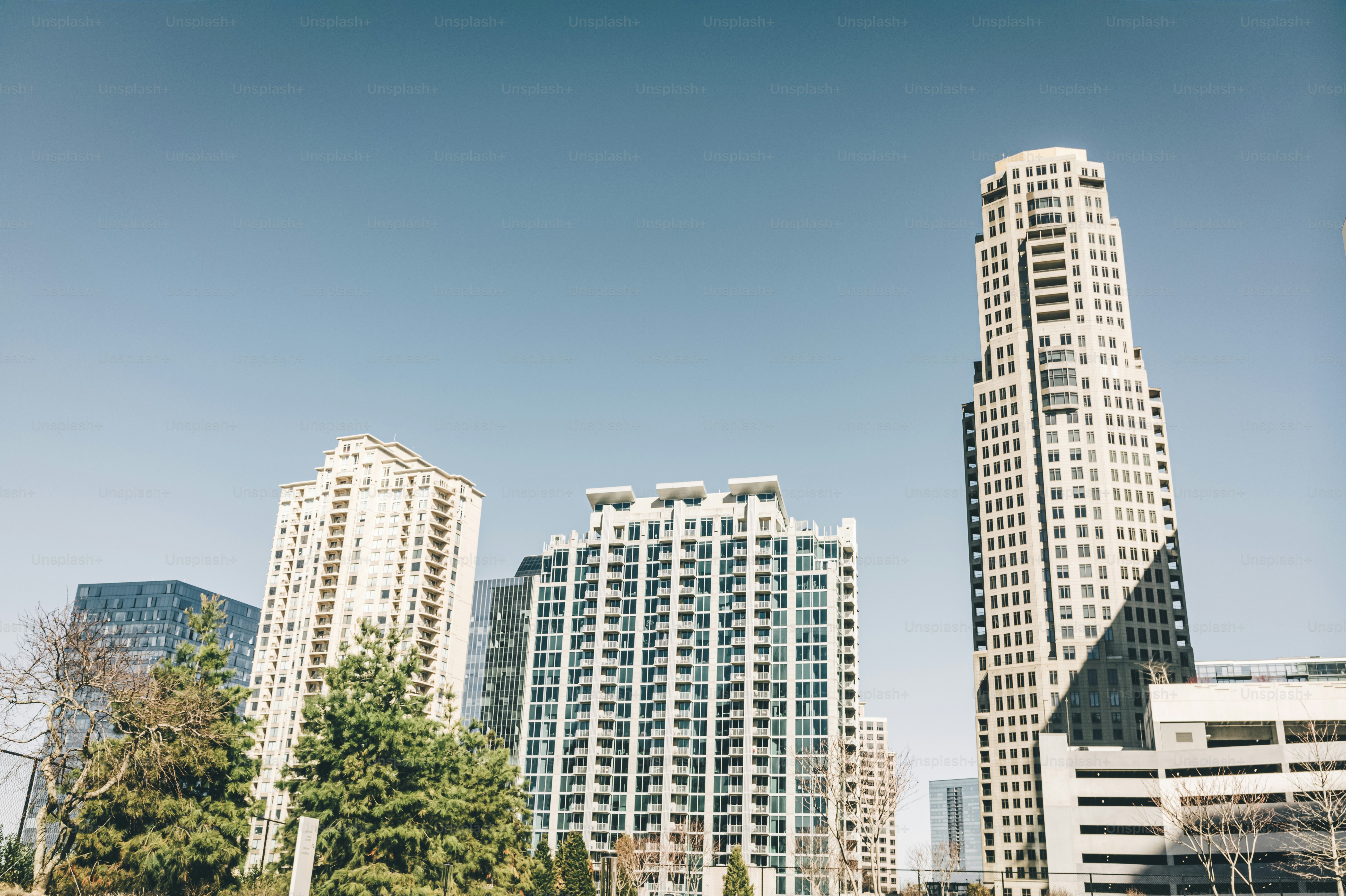a group of tall buildings sitting next to each other