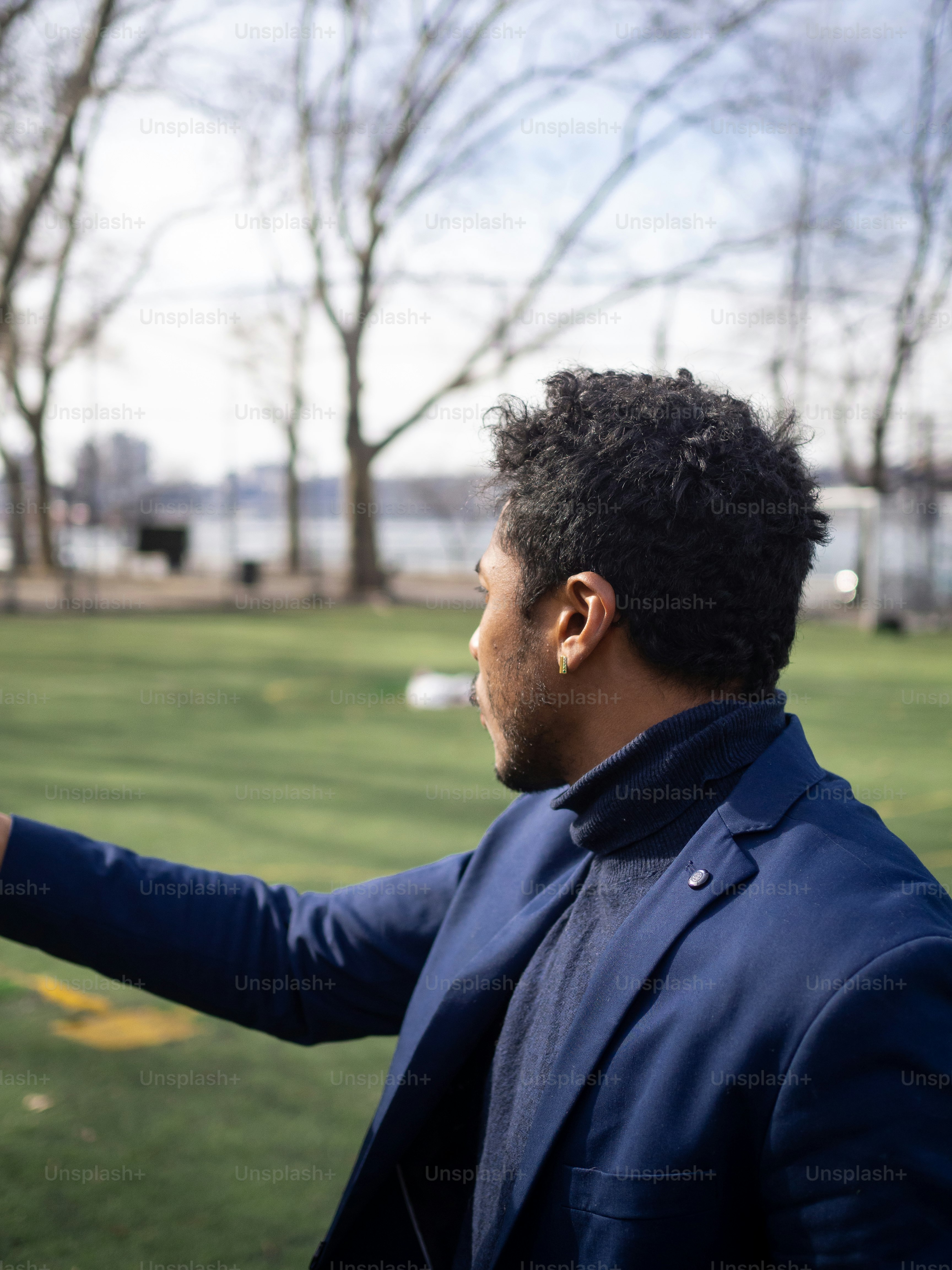 a man holding a frisbee in his right hand