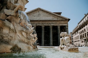 a building with a fountain in front of it