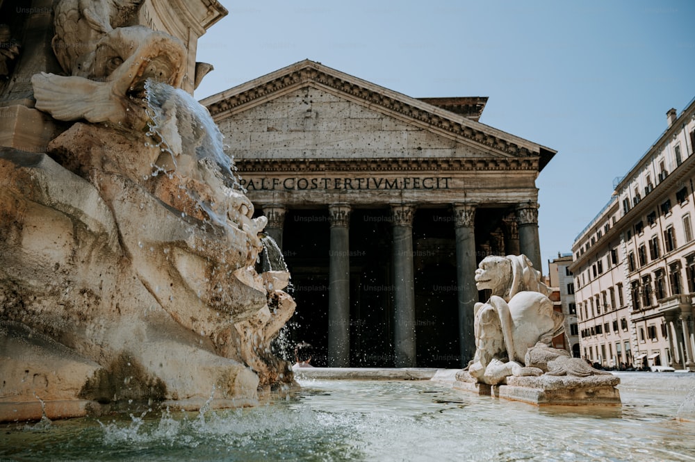 a building with a fountain in front of it