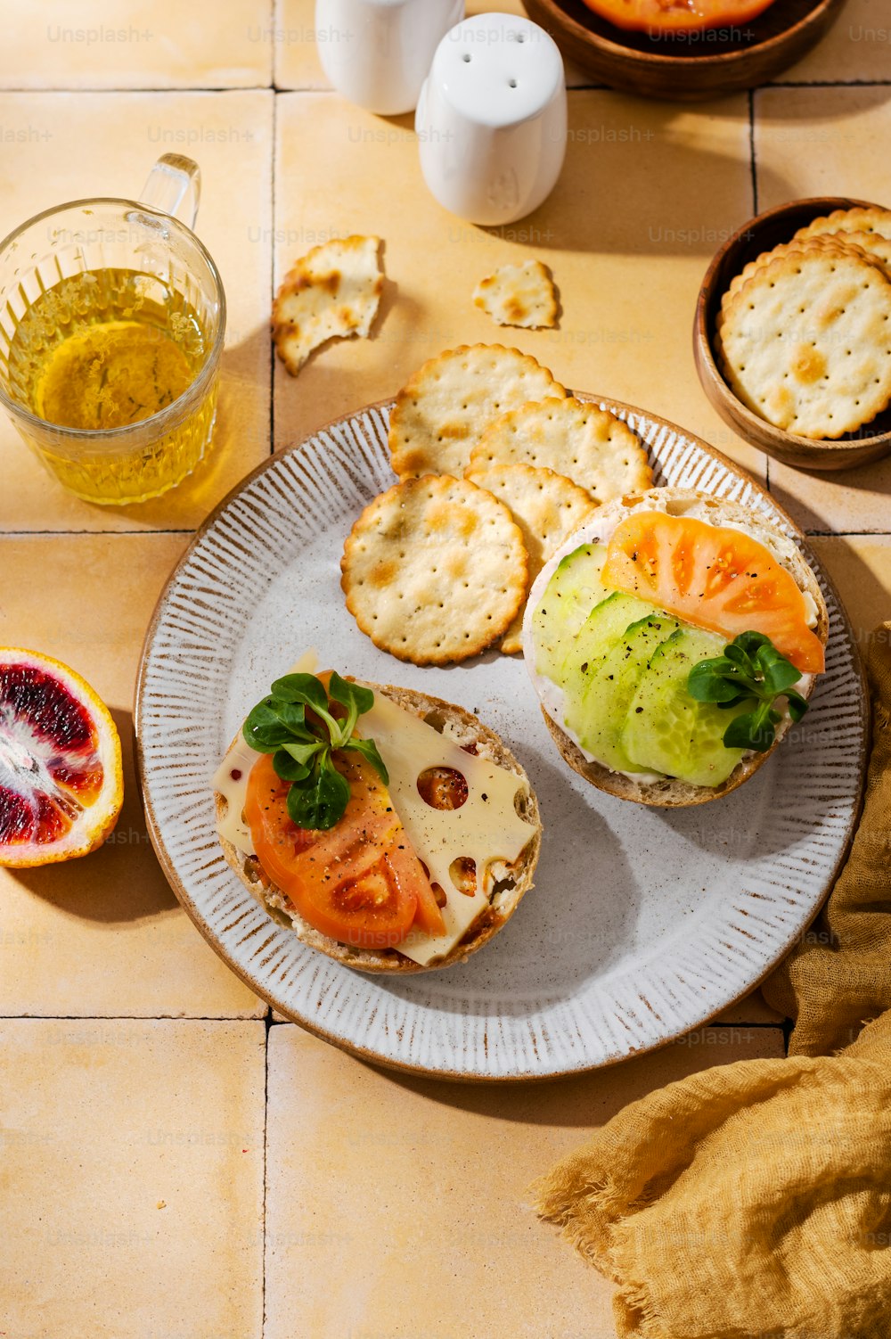 a plate of food on a table with crackers