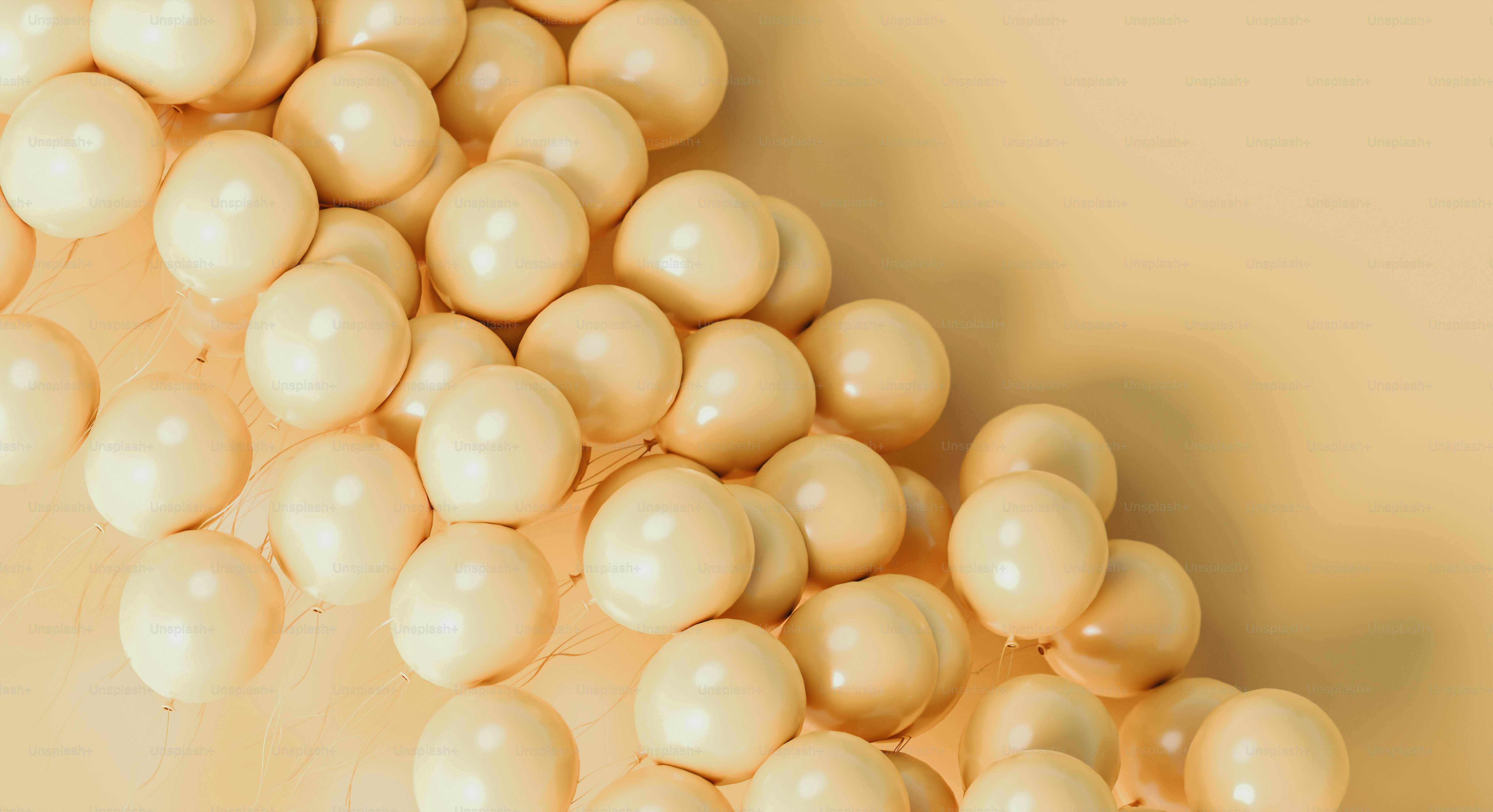 a bunch of balloons that are on a table