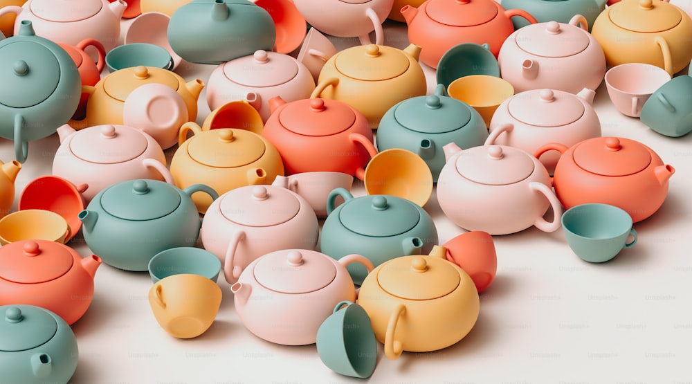 a group of colorful teapots sitting next to each other