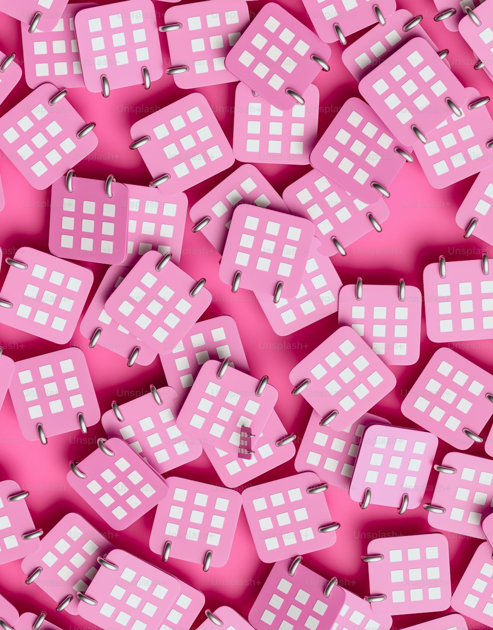 a lot of pink and white dices on a pink background