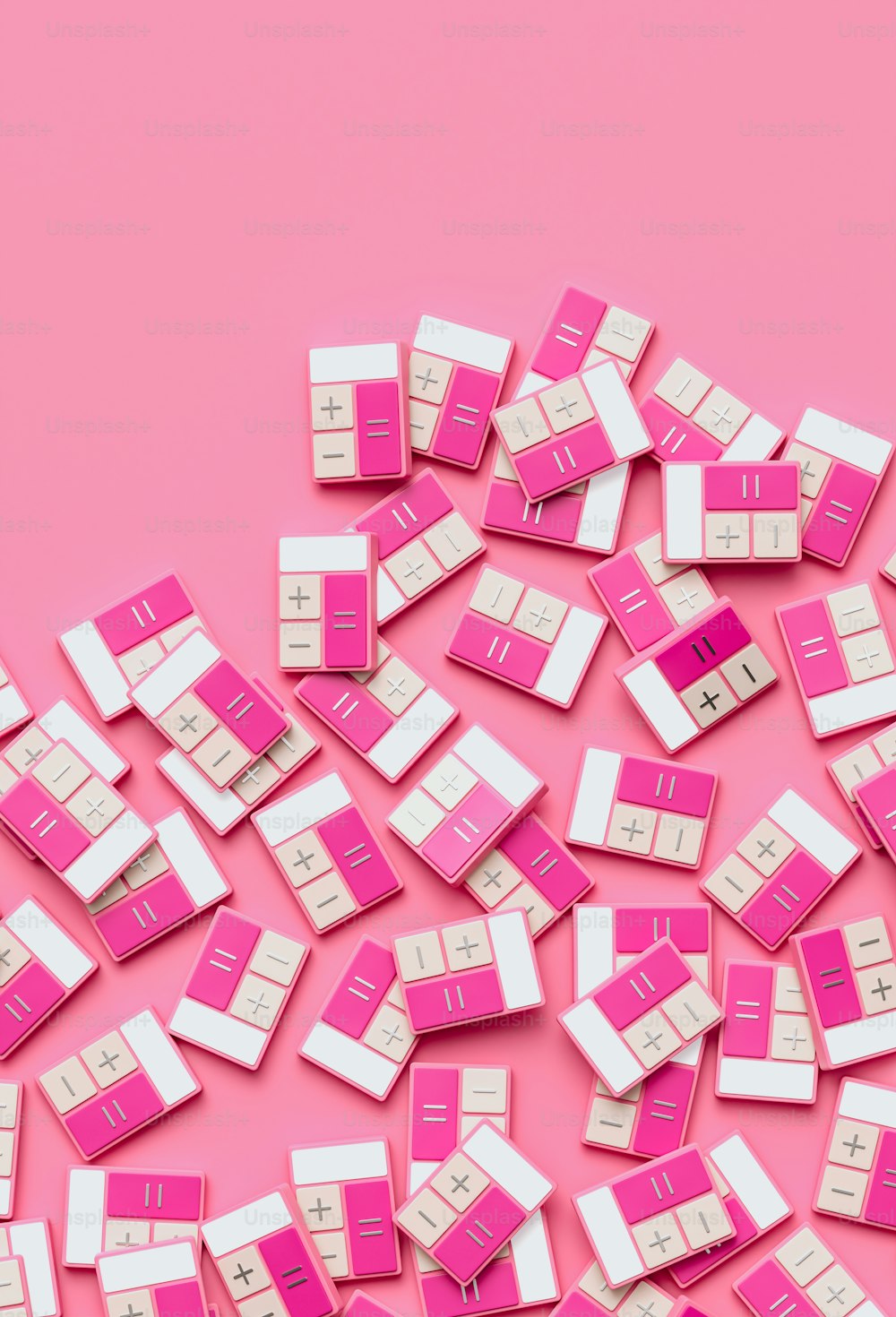 a pile of pink and white computer keyboards on a pink background
