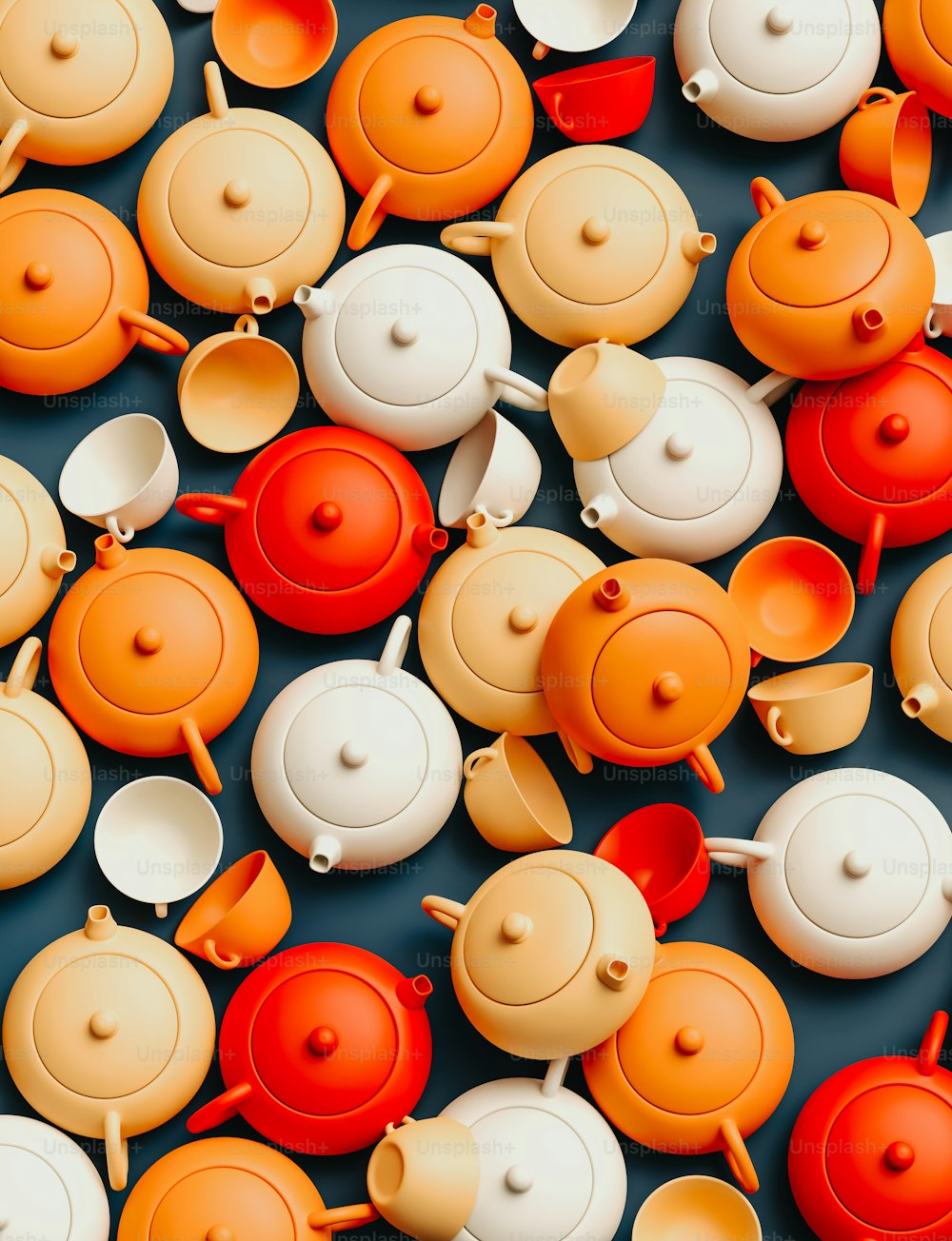 a group of orange and white teapots sitting next to each other