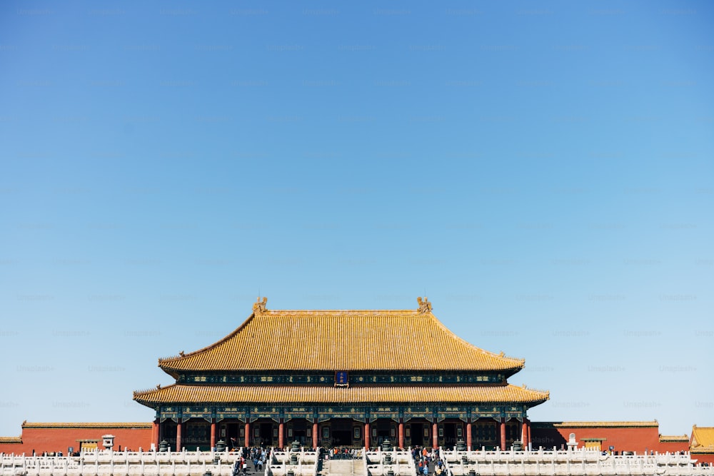 a tall building with a sky background