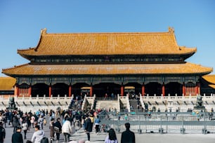 a large group of people standing in front of a building