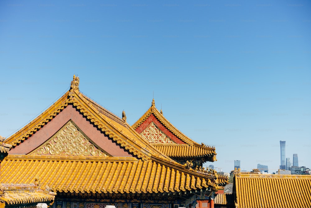 the roof of a building with a blue sky in the background