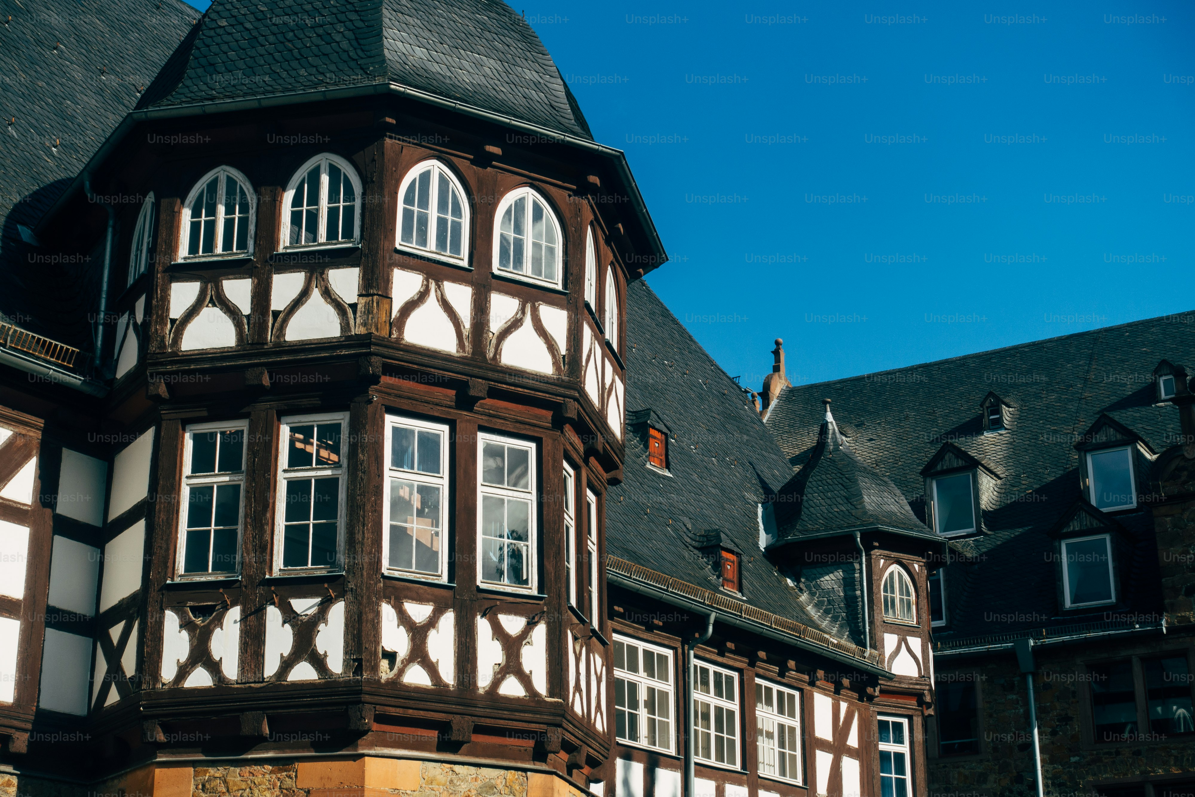 a tall building with a clock on the front of it