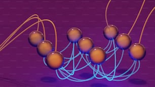 a bunch of balls that are on a purple surface