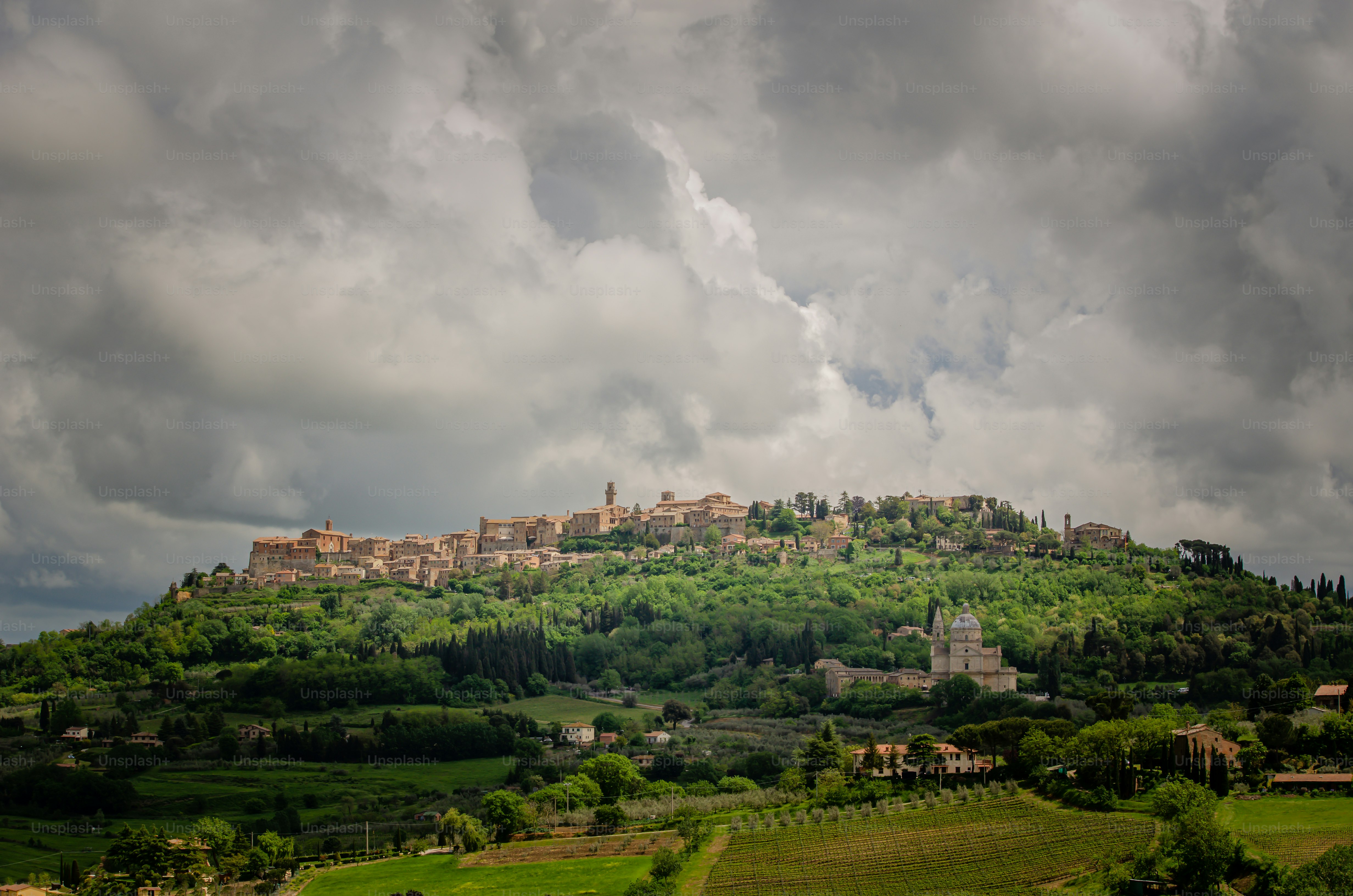 a hill with a village on top of it