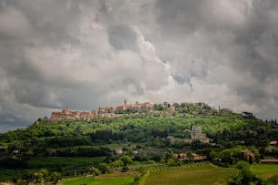 a hill with a village on top of it