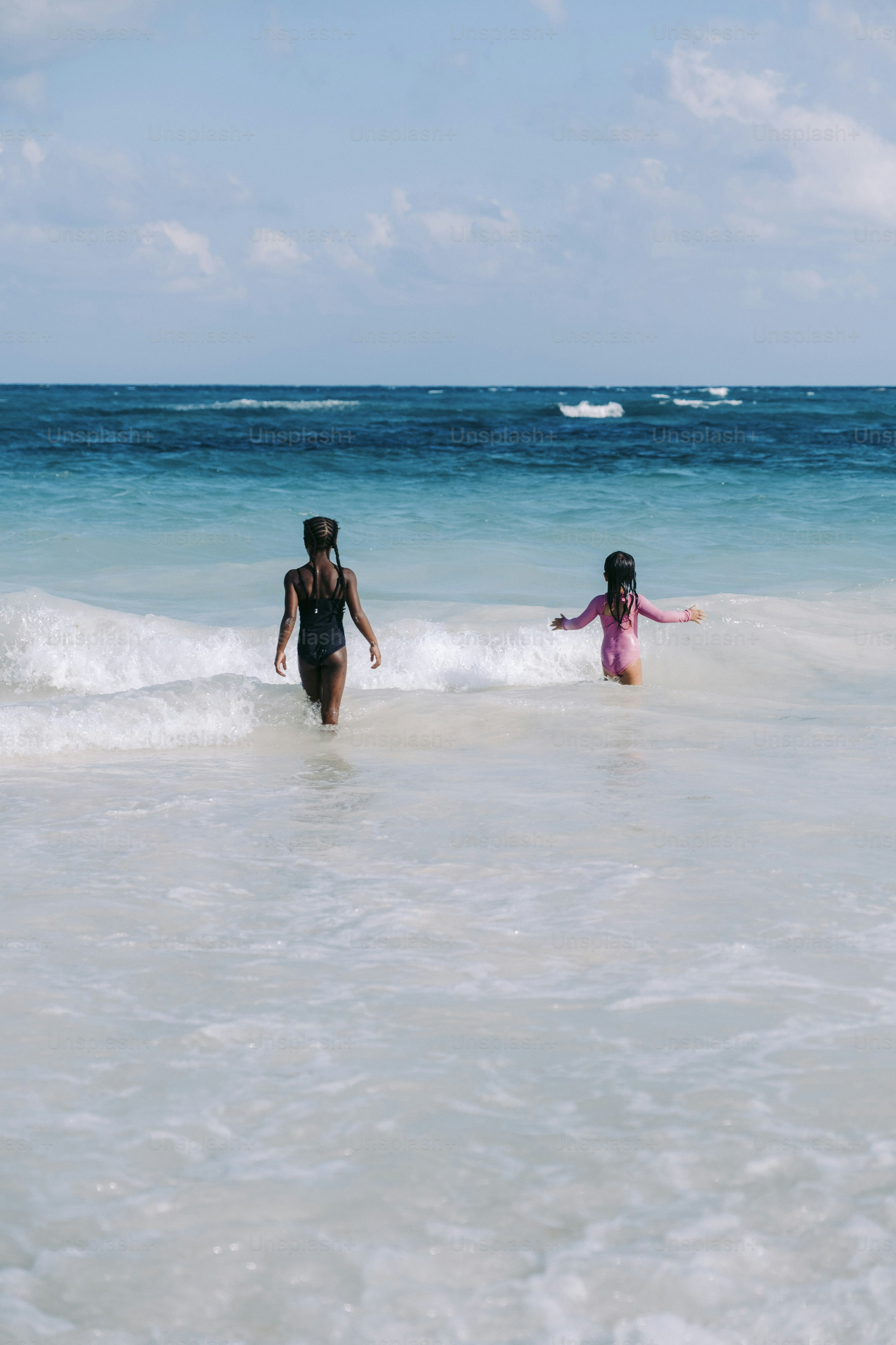 a couple of people that are in the water
