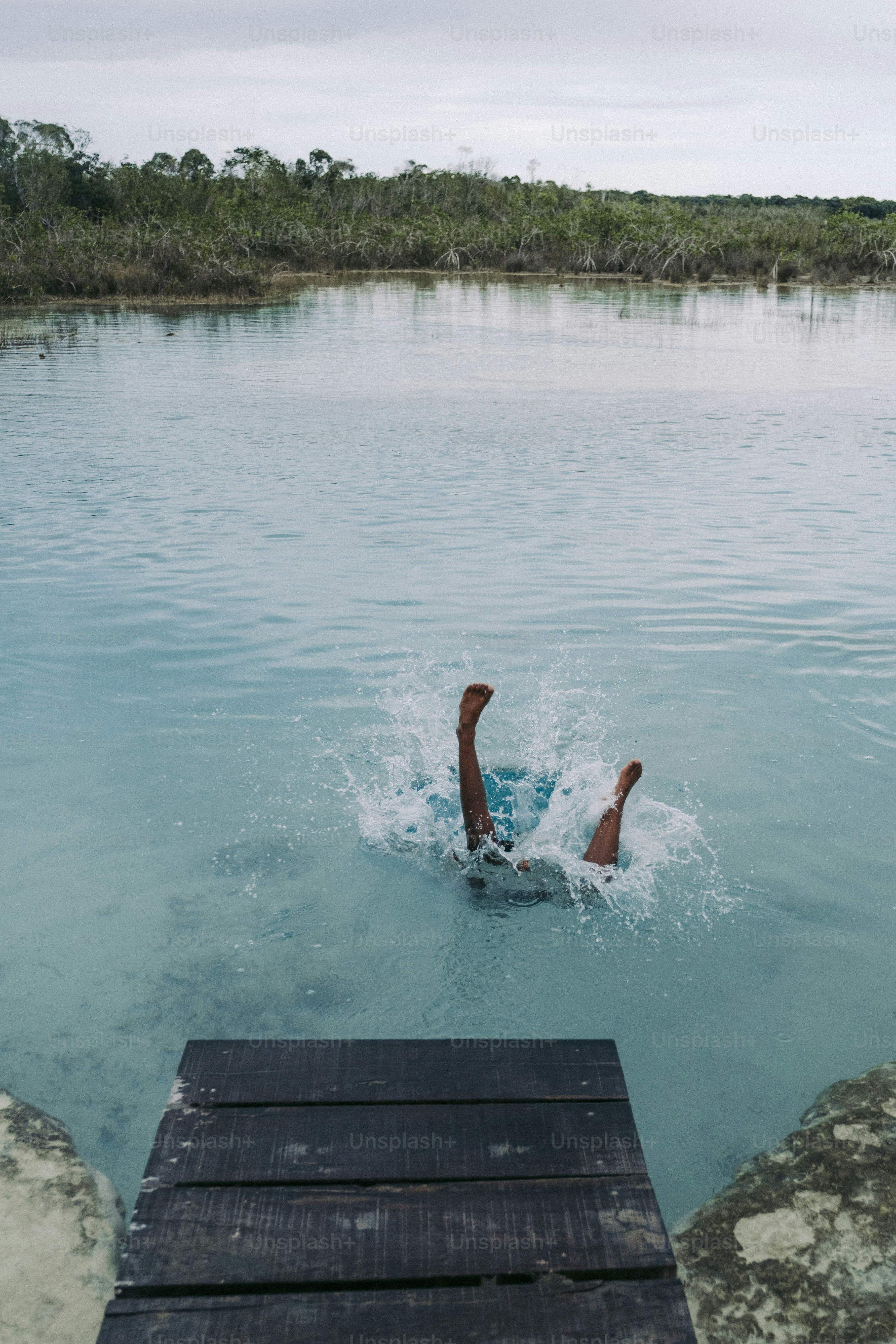 a person swimming in a body of water