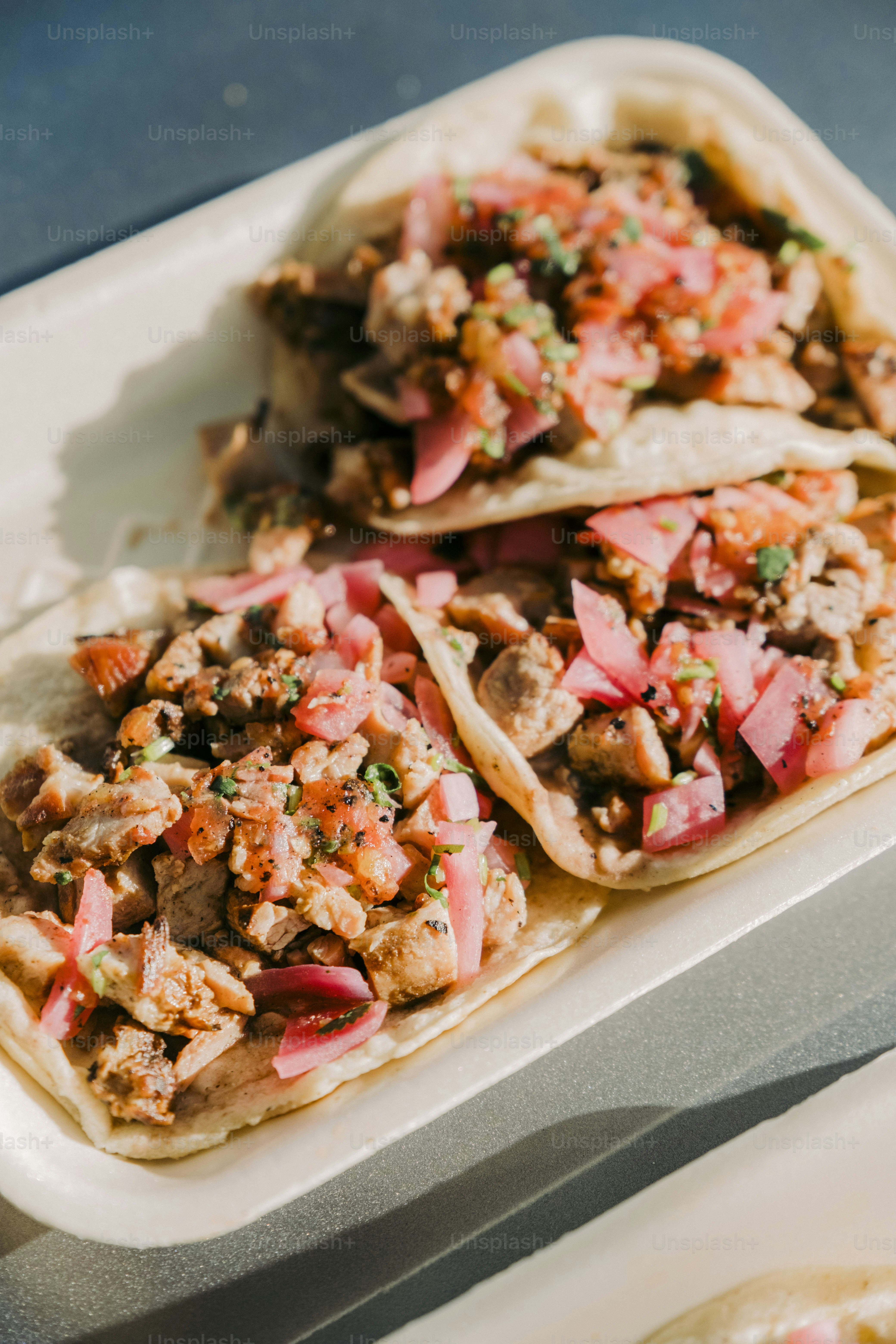 a plate of food with meat and vegetables on it