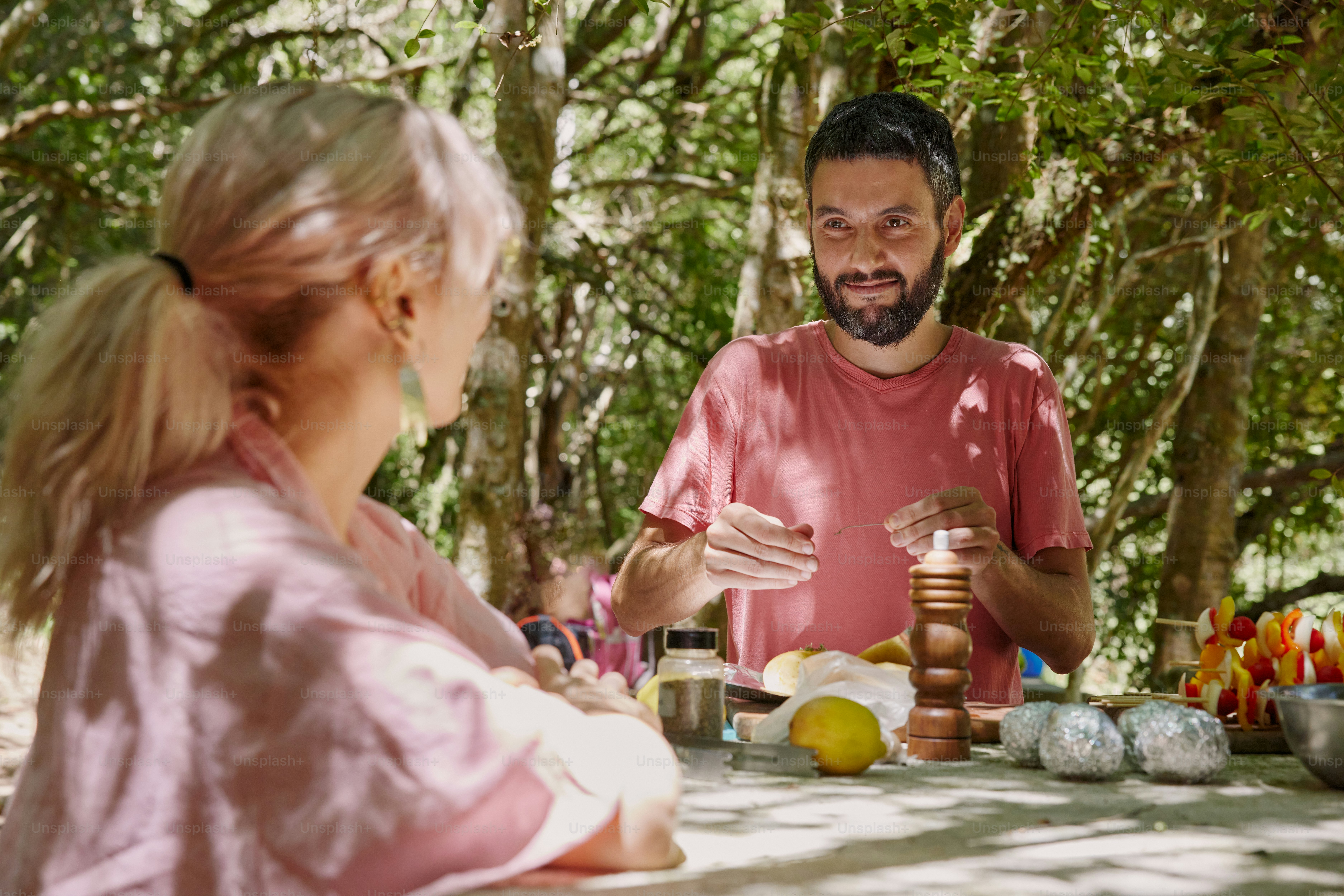 a man sitting at a table with a woman