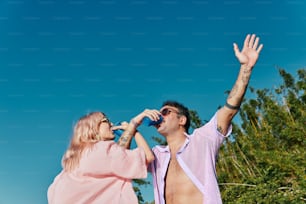 a man and a woman are drinking water