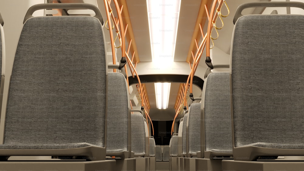 a row of seats on a train with a skylight