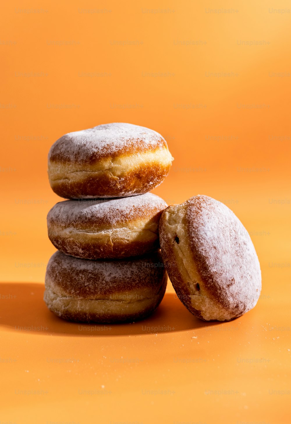 a stack of doughnuts sitting on top of each other