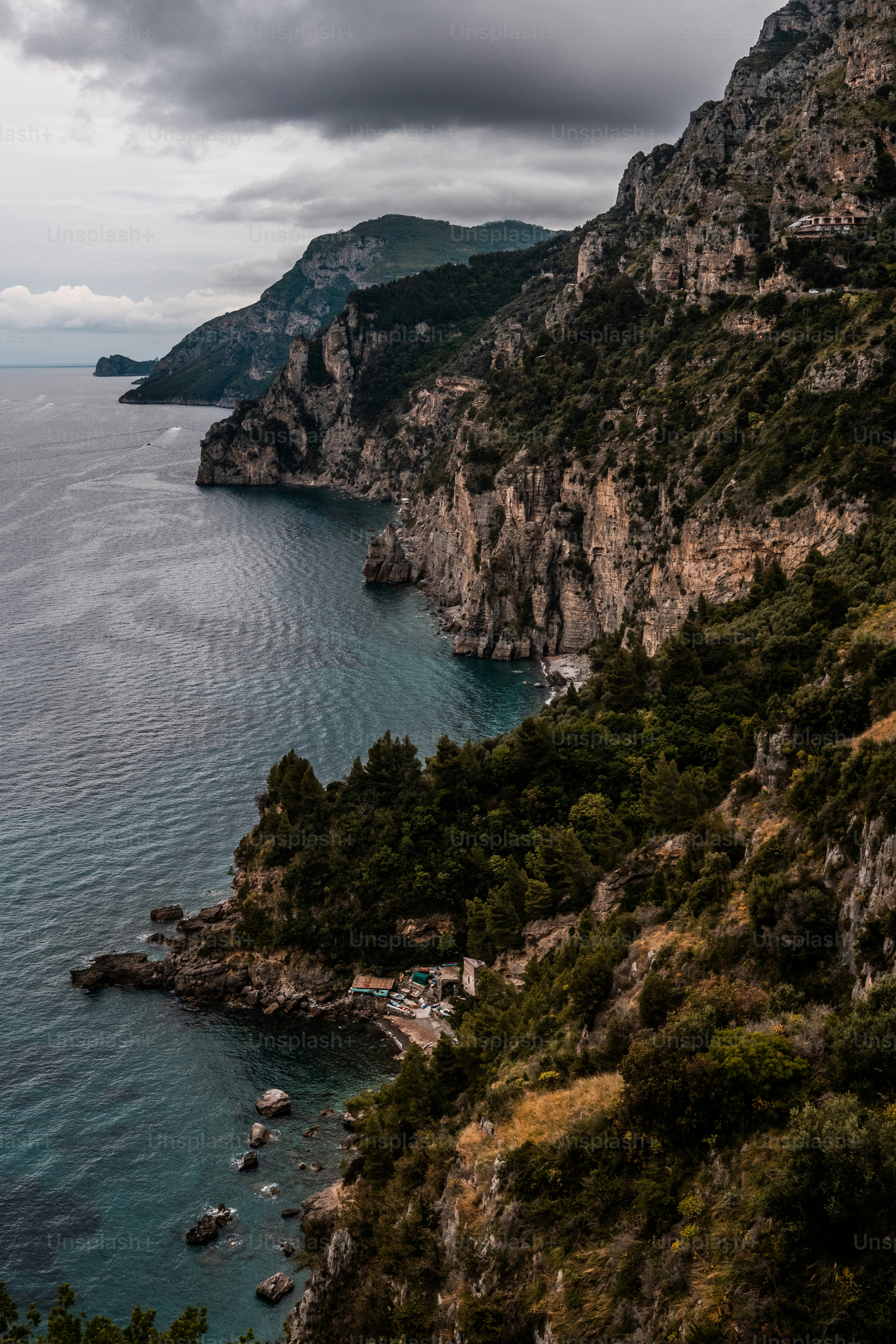 a scenic view of a body of water surrounded by mountains