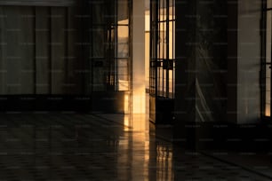 the sun is shining through the windows of a building