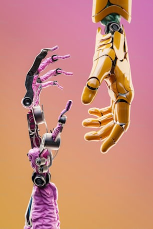 a robot holding a human hand in the air